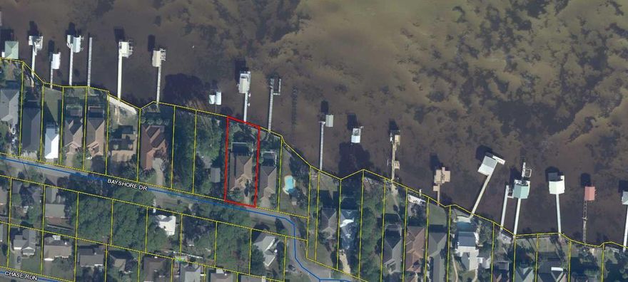 Mediterranean meets Coastal ! Beautiful bayfront home built by Award winning Dixon Kazek Construction. It has been professionally and decorated with amazing finishes and decor. Upon entering the double solid wood front doors you step into a spacious foyer incorporating a 22 ft ceiling. Stunning light fixtures and a winding staircase. A study/sitting room features wood beams on the ceiling and plenty of recessed lighting complimenting natural light. Gorgeous wood floors and a cast stone surround at the gas fireplace Awesome outside views from inside and outside. Screened in pool area with fire place, hot tub and walkway out to your boat dock with fish cleaning station and lifts for 2 wave runners!
This is a must see!!