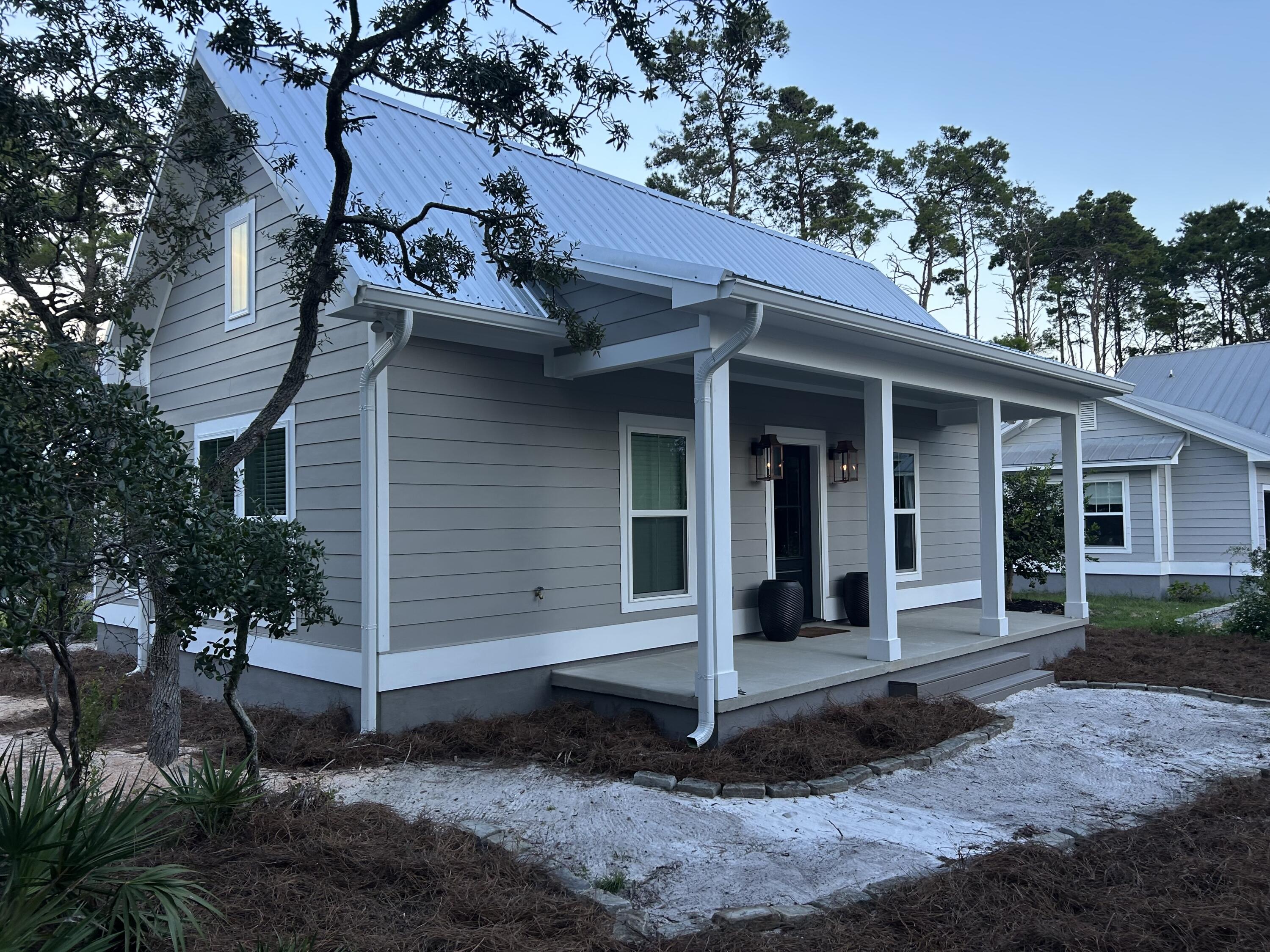 Brand new Florida Cottage for rent 6 months minimum. Furnished or unfurnished. This 2 bed/1 bath cottage features vaulted ceilings, upgraded flooring, cabinets, countertops, appliances, washer/dryer, lighting, ceiling fans, large walk-in shower. gas lanterns, on demand hot water and many other features.