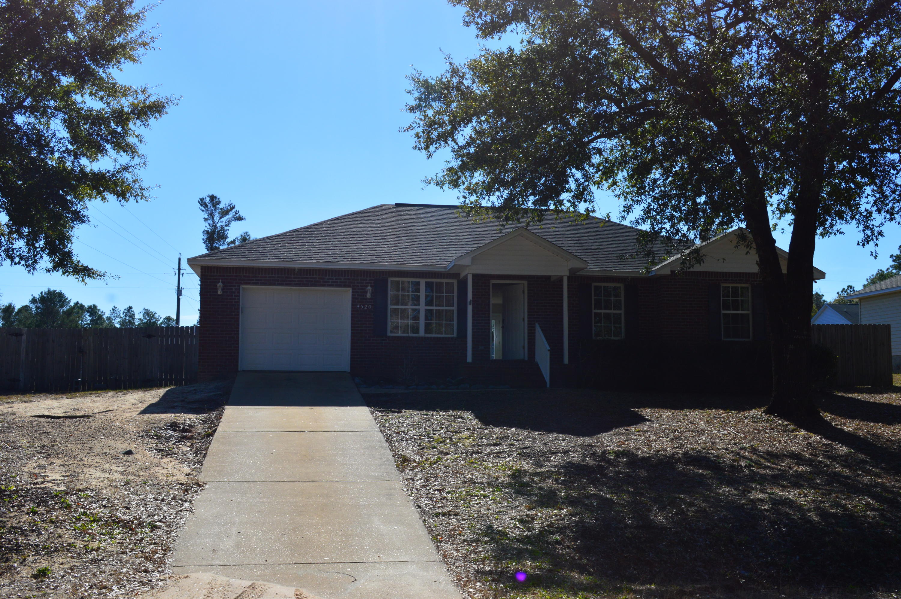 Spic and span 3 bedroom and 2 bath home on nearly 1/3 acre with fenced back yard. Brick and vinyl home for easy maintenance. Good location between Crestview and Defuniak Springs with a short jog to Hwy 285 and all points south. Split bedroom design with new paint and carpet. Roomy kitchen and sought after open concept design. Don't miss out on this well kept and tidy home!