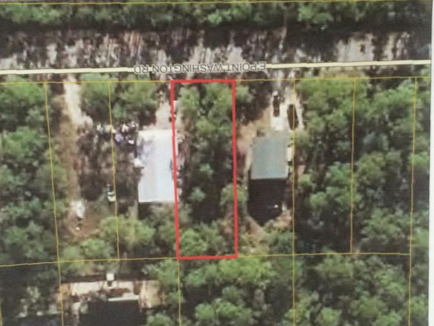 Nice dry lot in grow area of Pt Wahington. Short distance to bay for boating and fishing. Lot was cleared two years ago.