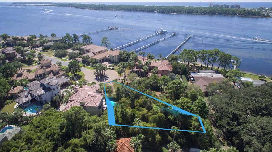 AMAZING location!! Build your dream home with a spectacular view of the Gulf of Mexico. This vacant lot is located at the end of the Cul-De-Sac for the ultimate privacy. Finisterre Gated Community offers tennis courts, playground, luxurious landscaping and a community boat dock which will accommodate large boats. The Mediterranean Architecture throughout the community creates a virtual bon voyage, a trip abroad without leaving the house. With it's bold and striking design it carries a strong sense of place and entices you with its exotic promise of peace and tranquility!!