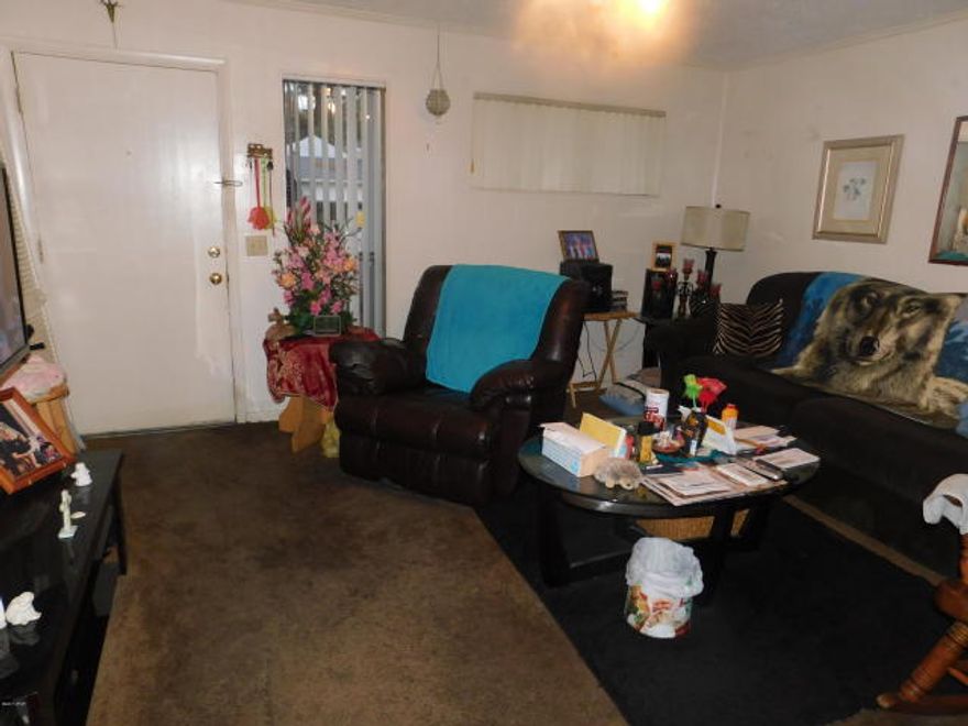 BRING ALL OFFERS! This unit is currently vacant, the unit needs work but would rent short or long term quickly. There is also another 1 bedroom condo and a townhome that are both available with long term tenants. This is a perfect opportunity to invest in a few rentals that are already making income or renovate your own Panama City Beach hide-a-way to your taste!