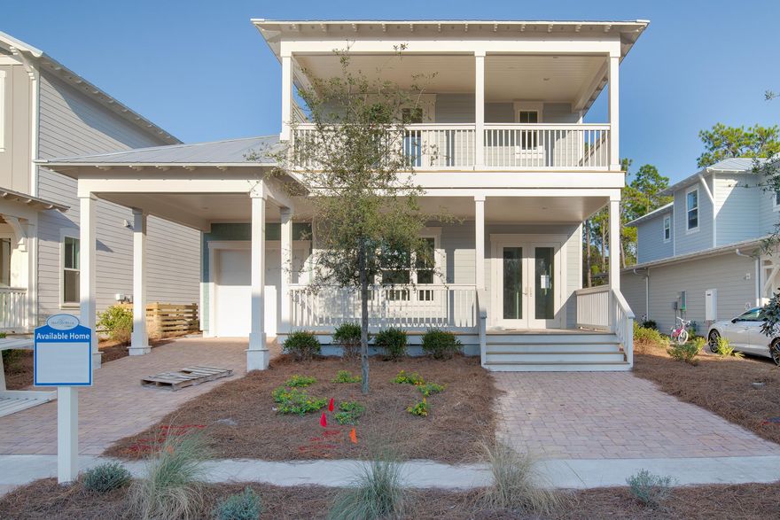 One of the last homes to be built in NatureWalk! This popular Sandcastle plan has the master suite on the 1st floor, an extended guest suite and 2 more additional bedrooms upstairs with their own baths! Perfect for full time family! Features include wood flooring throughout, subway tile backsplash, granite countertops, freestanding tub, carport, and more! Our standards are other builder's upgrades- impact resistant doors & windows, wood floors throughout, outdoor showers and much more come with every new construction home in here.