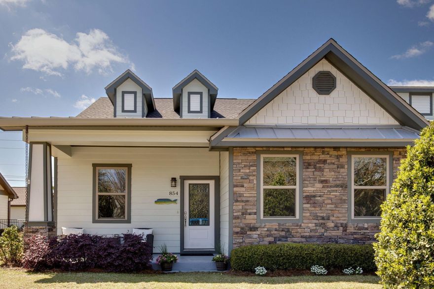 Don't miss the opportunity to own in Osprey Landing!  Rarely do these charming homes come on the market.   Location, location, location in the heart of Destin.   Pretty streetscape!   Private street and quiet.   Just minutes away from the white sand beaches of the Gulf.   Convenient to shopping and groceries .    This open concept home is perfect for entertaining with a large kitchen and living area which opens to the quaint backyard. The kitchen has new stainless appliances, gas range, microwave, dishwasher and counter/bar.  There is also an eat in kitchen nook, and a walk in pantry.    Large master suite and closet with built in shelves. Master bath has separate shower and garden size tub, double vanities, tile floors. Hardwood floors in living area, kitchen, hallway, master bedroom and guest rooms.   Tile in master bath, guest bath and laundry room.  Crown molding throughout, vaulted ceilings, recessed lighting,  2 car detached garage in the back of the home.  Yards are included in Home Owners Fee.   Privacy fences on all sides of the yard.  Paver patio in the backyard.   Gated back driveway entry.  Home has a termite contract that is transferable. Much much more.