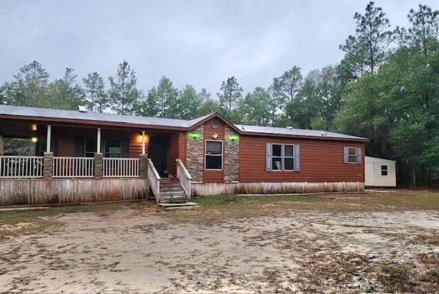 Come to the Country! This 3 bedroom, 2 bath mobile home is situated on 5+ acres with a huge workshop/garage.This property gives you room for the privacy and gardening and other outdoor activities that you have been looking for without neighbors right at your back door.