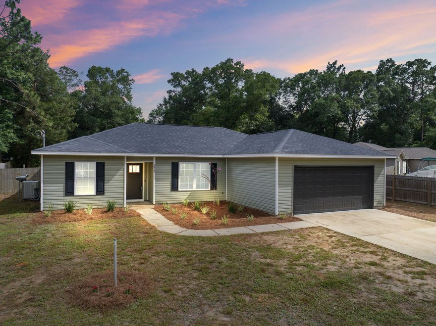 Charm meets convenience in this delightful single-family home! This 2018 build offers four bedrooms and two bathrooms or can be utilized as three bedrooms and an office space, depending on your needs. As you enter, you will find a spacious open-concept living area, and fresh paint throughout the home. The main living area, kitchen, and bathrooms feature new LVP flooring, while the bedrooms have new carpeting. The kitchen has been updated with new countertops, a modern backsplash, new hardware, lighting and refreshed cabinetry. The primary bedroom features an updated ensuite bathroom with a new vanity countertop, vessel sinks, lighting, fixtures and hardware. The second bathroom is updated with a new vanity, sink, toilet, faucets and hardware for a clean and contemporary look.