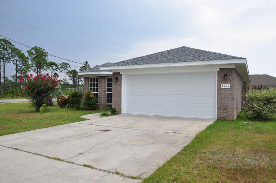 Home situated on corner lot has been completely remodeled with new interior paint, lighting fixtures, kitchen appliances, granite counter tops, carpeting, hardwood flooring in living and dining room area new roof and HVAC. This split bedroom design has something special for every member in the family. Inside utility room and a 2 car garage. A covered porch for enjoying an afternoon visit with friends who drop by. A large privacy fenced yard that will accommodate a pool. The open kitchen has a breakfast bar and eat-in kitchen. A kitchen with granite counter tops, Stainless Steel Appliance and open to the great room and dining room ''PRICELESS''. All this with High School a short walk away.