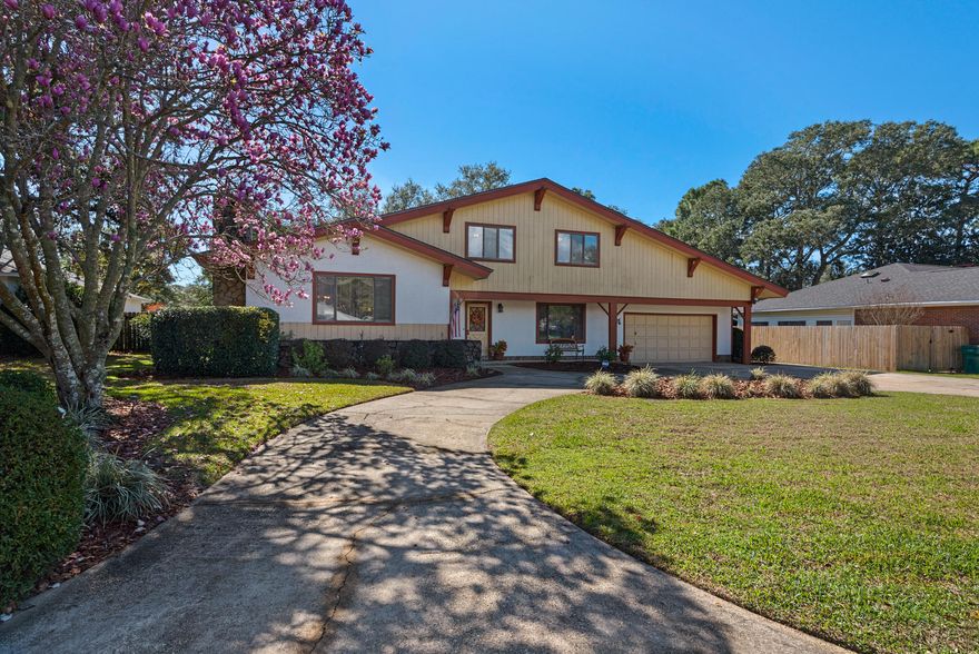 Ideal Florida Living Alert: One of the most desirable neighborhoods. 3000 plus sqft. Situated on huge, fenced in lot which backs up to well-manicured Shalimar Golf course. This 4 bedroom, 2.5 bath home in the desirable community of Lake Lorraine in Shalimar has something for everyone. The character is apparent immediacy as you enter the cathedral ceilings and exposed beams over the living room and formal dining. In the kitchen, chefs will love the solid surface countertops, center island, built in desk area and separate laundry room with plenty of storage (laundry chute included). Kitchen spills out to a giant second living space with floor to ceiling window and an additional gas fireplace. Take the party through the sliding glass doors to enjoy the ultimate backyard with in-ground pool