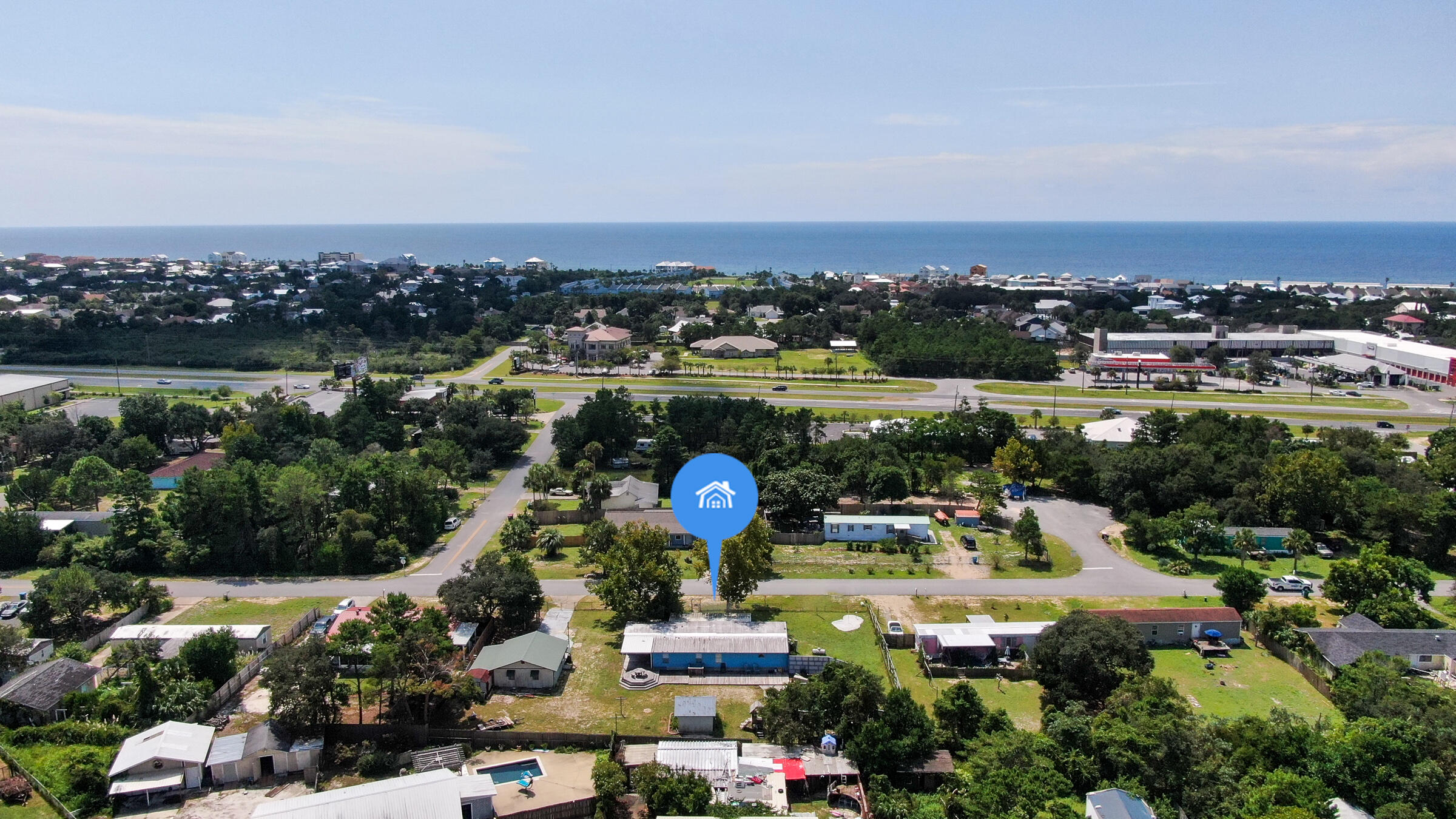 This is a large lot on the desirable west end of the beach on the north side about 1 mile off the Inlet Beach bridge/30A. This lot is dividable to make it two full size lots it is zoned single family R-2 or up to a duplex. There are structures on property but no significant value ascribed.