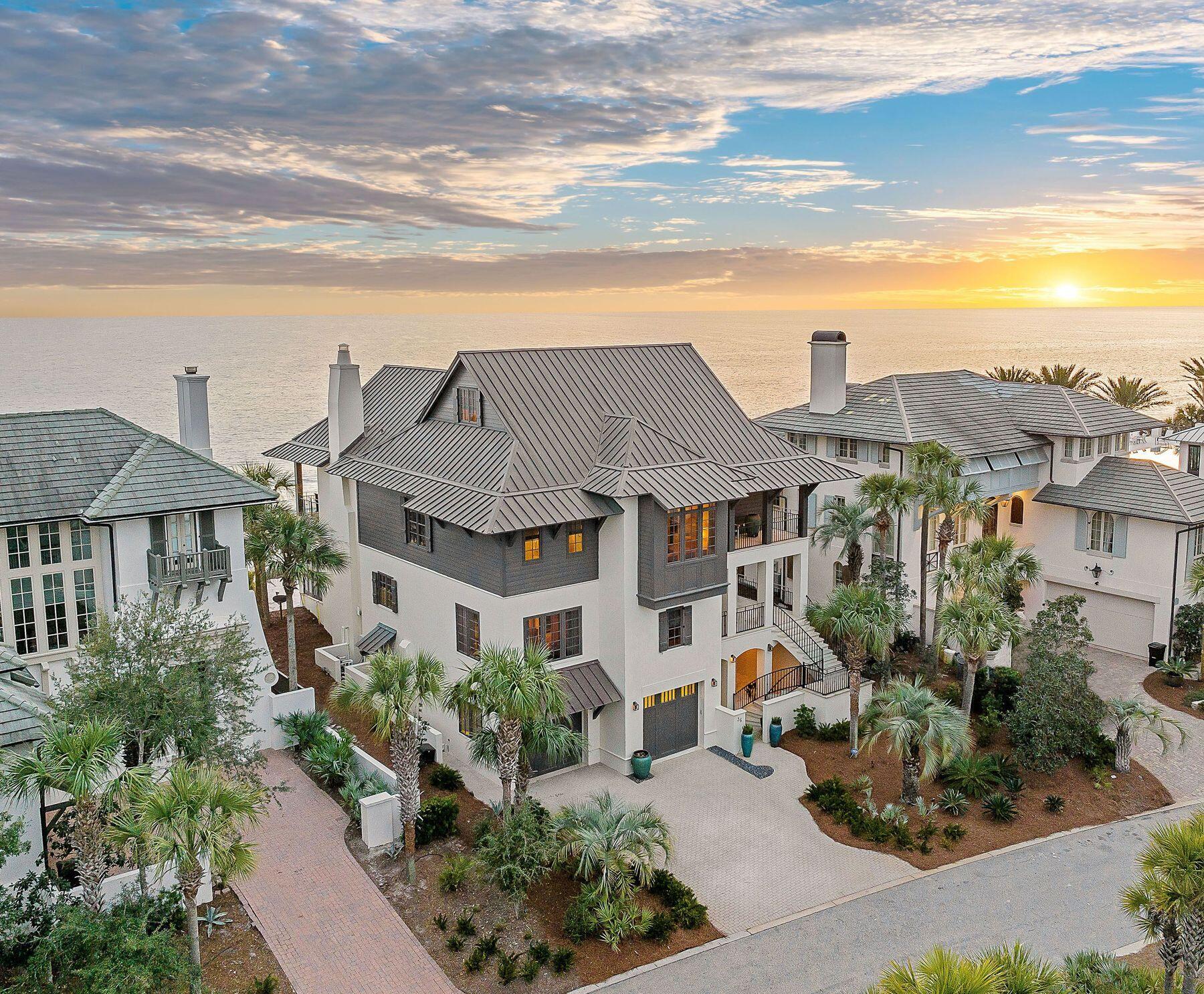 Sitting atop Blue Mountain Beach overlooking white sand coastal dunes, this beachfront home reflects the prestige of 30A's most desirable community, The Retreat. Deeded to water's edge, meticulous construction, ''smart home'' features, and year-round outdoor living make this an exceptional opportunity. South facing, this one-of-a-kind home offers uninterrupted 180-degree views to Destin and Panama City Beach. A whimsical entry door opens onto a sunlight-filled main floor highlighted by a grand staircase. This exquisitely fully-furnished masterpiece accentuates a light, bright interior while hardwood flooring and wood beams bring warmth throughout the living and bedroom spaces. Indoor and outdoor spaces are seamlessly joined by stone flooring. Four floors, five bedrooms and six-and-a-half