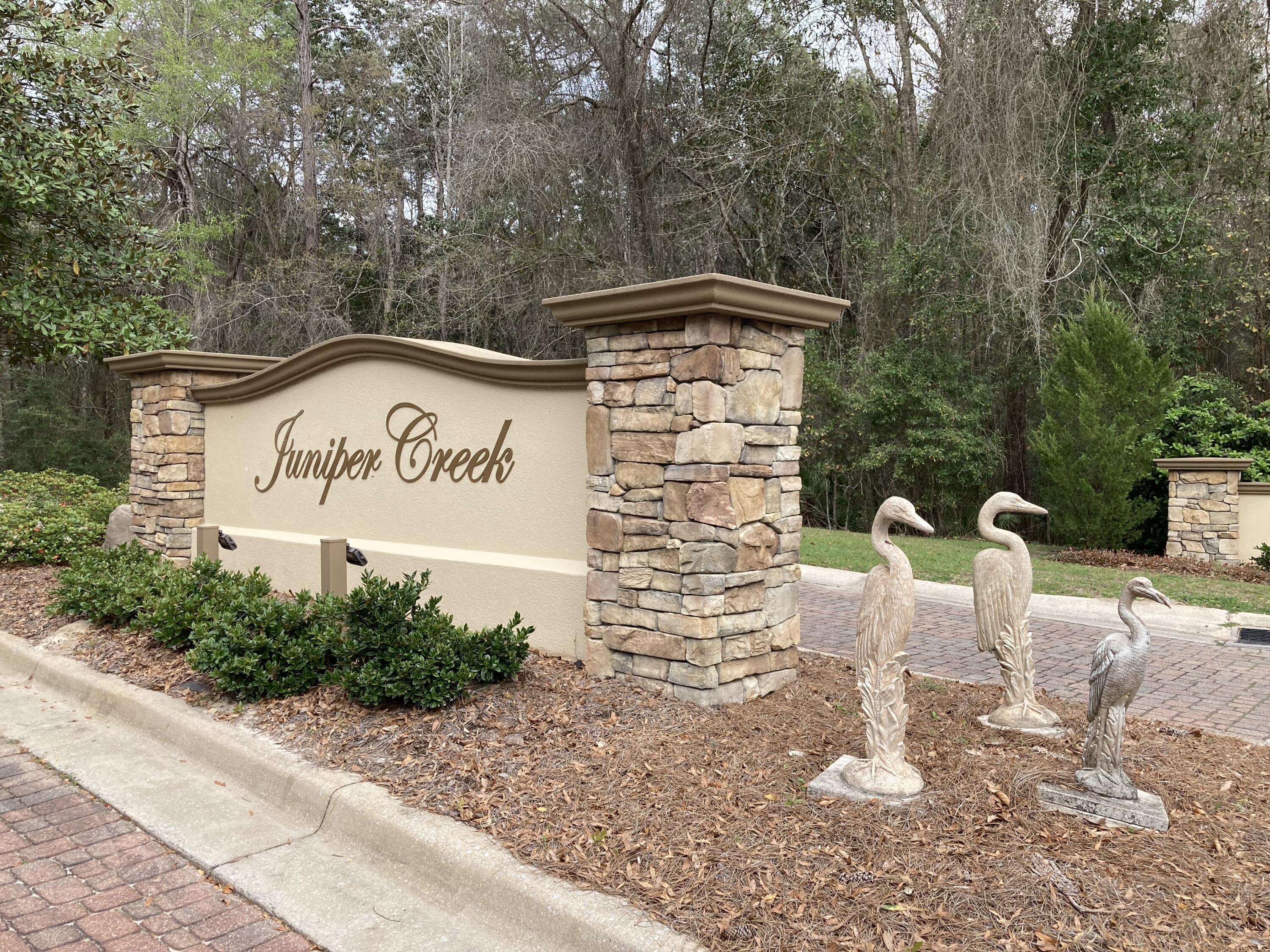 KG II Development semi-custom home in the exquisite Juniper Creek neighborhood. This open floor plan home includes four bedrooms, (one-bedroom doubles as an office) with three baths. Master bath includes separate shower with seat, garden tub, huge walk-in closet, comfort height commode, and double vanity. LVP flooring throughout most of the house. Kitchen sports a large island with Kohler sink, wet bar with ice maker and beverage cooler and a walk-in pantry. Huge back porch is plumbed for future outside kitchen and wired for hot tub. Jack and Jill bathroom between two large spare bedrooms are wonderful for kids or guests. The third bath shows off a tile shower. Laundry room has plenty of space for any size family's needs. Large garage accommodates toys with extra garage door.