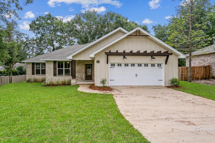 KG II Development semi-custom home in the exquisite Juniper Creek neighborhood. This open floor plan home includes four bedrooms, (one-bedroom doubles as an office) with three baths. Master bath includes separate shower with seat, garden tub, huge walk-in closet, comfort height commode, and double vanity. LVP flooring throughout most of the house. Kitchen sports a large island with Kohler sink, wet bar with ice maker and beverage cooler and a walk-in pantry.  Huge back porch is plumbed for future outside kitchen and wired for hot tub.  Jack and Jill bathroom between two large spare bedrooms are wonderful for kids or guests.  The third bath shows off a tile shower.  Laundry room has plenty of space for any size family's needs.  Large garage accommodates toys with extra garage door.