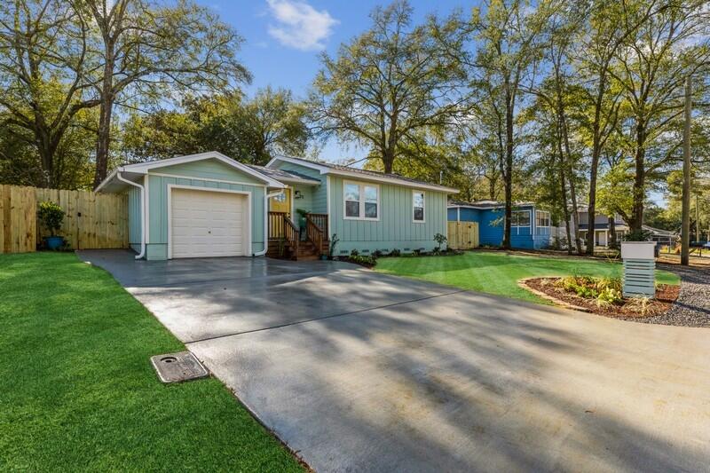 Modern Smarthome! Comes with Nest thermostat, Halo home lighting system, and touchless kitchen faucet technology. Because of the quality of upgrades, county appraiser changed the effective year to 2015. This fully remodeled home has refinished red oak hardwood floors in the majority of the home with modern tile finishes in the foyer and bathroom. The back yard landscaping was designed for friendship and family gatherings. From the hardi board siding to the solid interior doors, no expense was spared in creating this wonderful home. (USB Ports, Rinnai Hot Water System, New PEX Piping and Sewer Line, All new electrical wiring (up to 2022 Code) Homewerks Fan Suite with Bluetooth radio. This property is located within very close walking distance to Ruckel Middle Sc