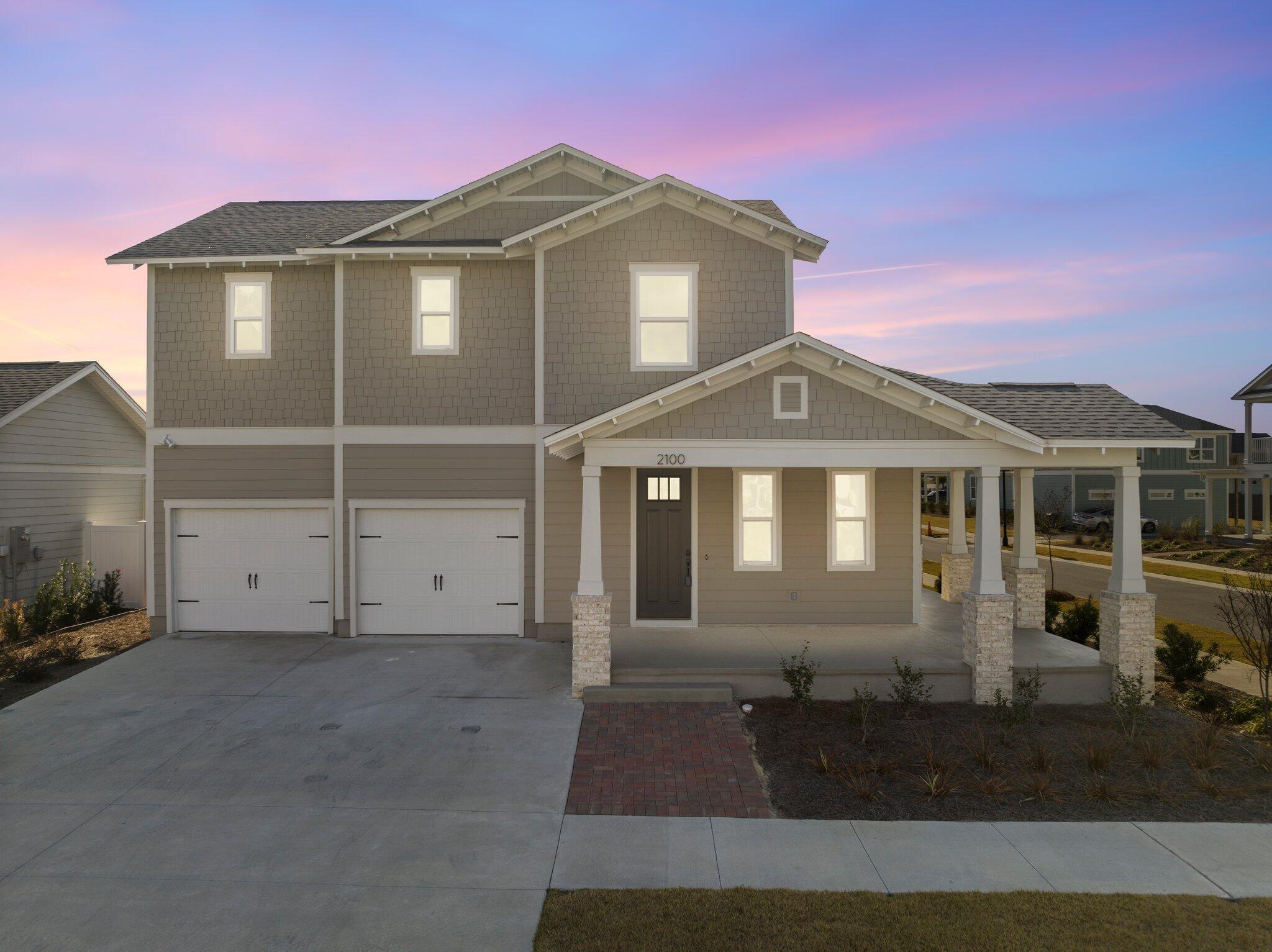 The Navarre plan by Harris Doyle Homes is offered in waterfront SweetBay and provides Priority Access to coveted free charter school University Academy, Florida's #2 K-8 School! This home is situated on a conservation home site with large porches, perfect for entertaining. 4 BR + large Bonus. The main level primary suite has dual closets and a tile-to-ceiling walk-in shower. SweetBay is a walkable and golf-cart community with unrivaled amenities: dock with Bay and Gulf access, boat launch for kayaking, private beach, paddle boarding, fishing, parks, resort pool complexes, fire pits, grilling areas, sports court, trails, Publix-anchored town center and future amenities including a marina! New home buyers even get priority access to top-rated University Academy, #2 in Florida!