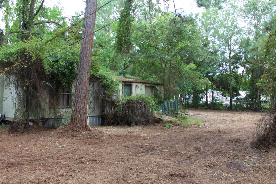 Excellent lot available close to military bases and beaches! This lot needs to be cleared. There is a mobile home on the lot that has no value. The home did have utilities! The tap fee has been paid. The chain link fence is still on the property. Buyer to verify all information and dimensions.