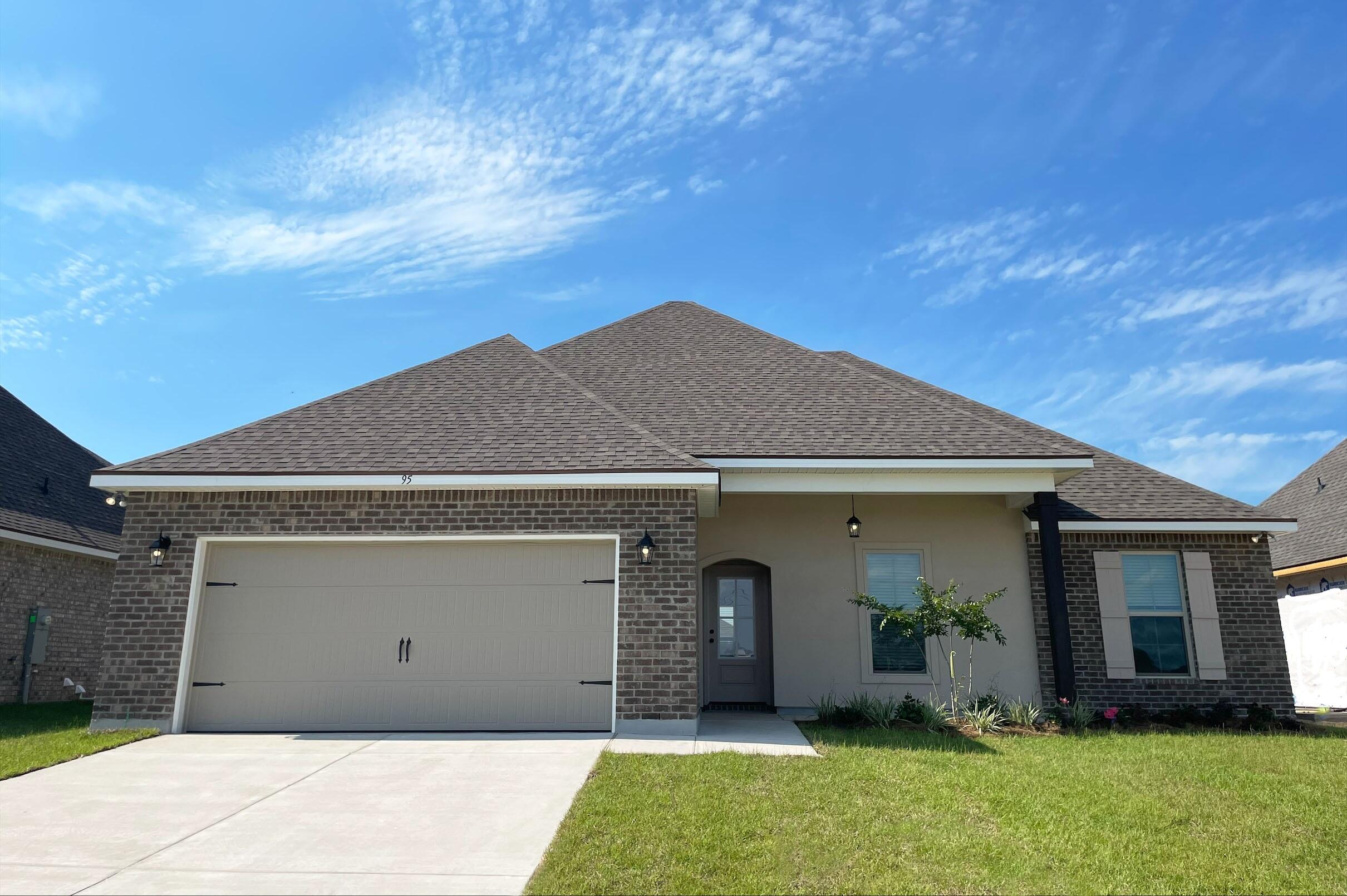 Awesome builder rate, FREE window blinds + choice of 2 FREE: front gutters, fridge, OR smart home package. Restrictions apply.The IRISES V A in The Bluffs at Lafayette community offers a 4 bedroom, 2 full bathroom open design. Upgrades added (list attached). Special Features: double vanity, garden tub, separate shower, and walk-in closet in master suite, kitchen island, walk-in pantry, covered porch/patio, crown molding, recessed lighting, framed mirrors, ceiling fans in living room and master bedroom, undermount sinks, smoke and carbon monoxide detectors, landscaping, architectural 30-year shingles, flood lights, and more!Energy Efficient Features: tankless gas water heater, kitchen appliance package, vinyl low E windows, and more!