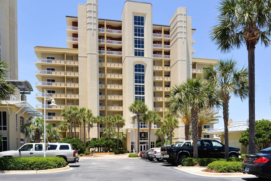 This highly desirable waterfront condo overlooking Destin Harbor features a large private balcony for enjoying panoramic gulf, marina, and sunset views. Enjoy the fresh air as boats come and go, and the magical city lights after dark. Conveniently located on Holiday Isle this 1,531 square foot condo has two generous bedrooms and two bathrooms. The master suite with direct access to the balcony features his & hers closets, and a large bathroom with a walk-in shower and jacuzzi tub. The well-equipped kitchen has stainless appliances, granite counters and ample cabinets for storage. An added plus is the utility closet that tucks away the full-size washer, dryer, and extra refrigerator out of sight. Along with the benefits of gated security and deeded beach access there are two resort style