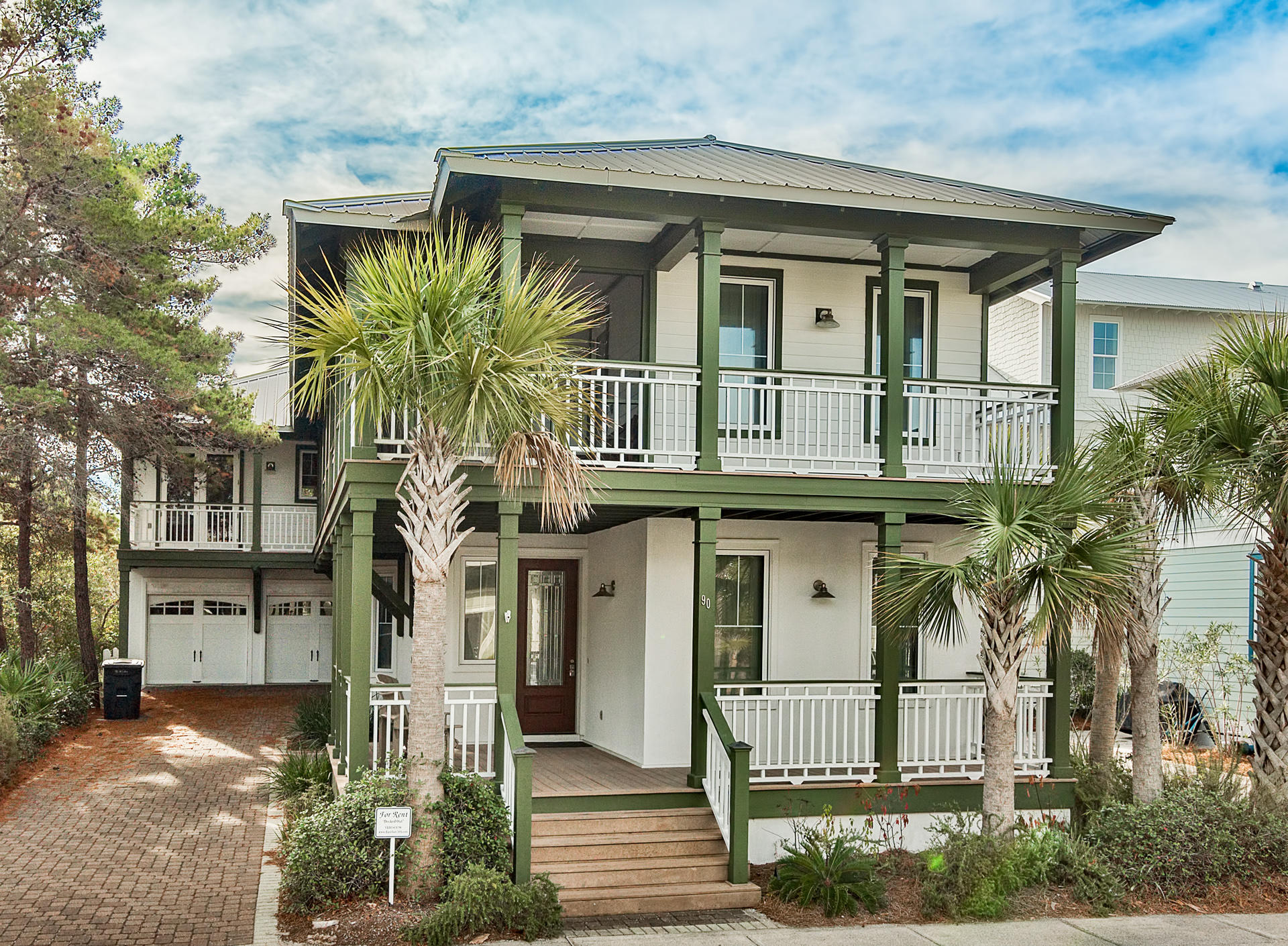 1,800 sq ft of wrap around porches with Trex decking, 2 of them screened, greet you when arriving at 90 Cobia Run. You will immediately notice the ample parking, featuring a 2 car garage and a long cobblestone driveway, a far cry from the normal 2 car spaces in front of most houses in the neighborhood. When you enter 90 Cobia Run, you will be delighted by the open floor plan featuring bamboo flooring. The rich cabinetry in the kitchen, solid surface counter tops, KitchenAid appliances, island and large dining area will make for many memorable evenings. You will appreciate having a bedroom and bath on the first floor, and upstairs you will find the master suite, with a large walk in closet, and an additional