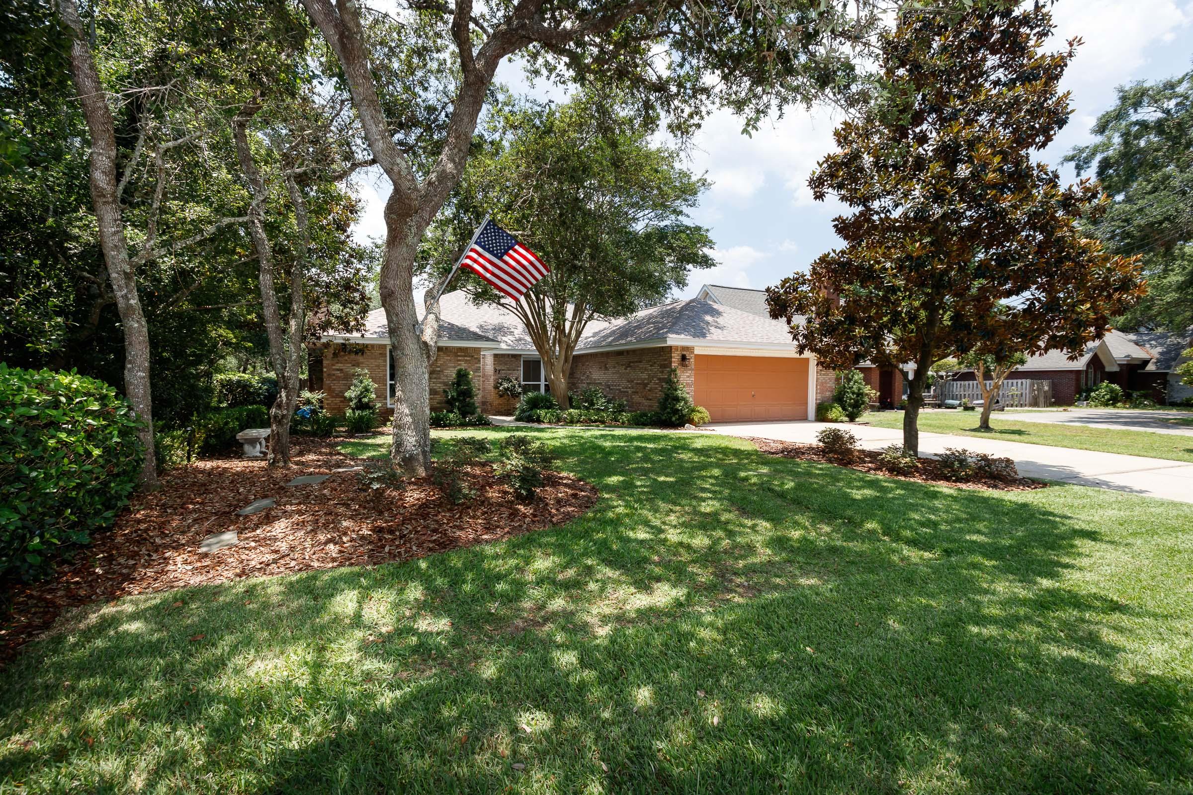 You must see this gorgeous home at the head of Lake Lorraine. This magnificent home has been maintained in pristine condition. Have your morning coffee over looking the pool, the waterfront, and bird sanctuary. Enjoy a cool swim in the 18x36 gunite pool. The home has a brand new roof. The kitchen has been updated and is a cook's dream with a new gas stove, matching appliances/cabinet covers and many other wonderful features. All bathrooms are recently updated beautifully. Lots of storage and closet space. Enjoy a cozy evening in front of the fireplace. With the waterfront view comes an opportunity to kayak to the bay (view aerial photos for an exceptional visual). You will not be disappointed in this home.