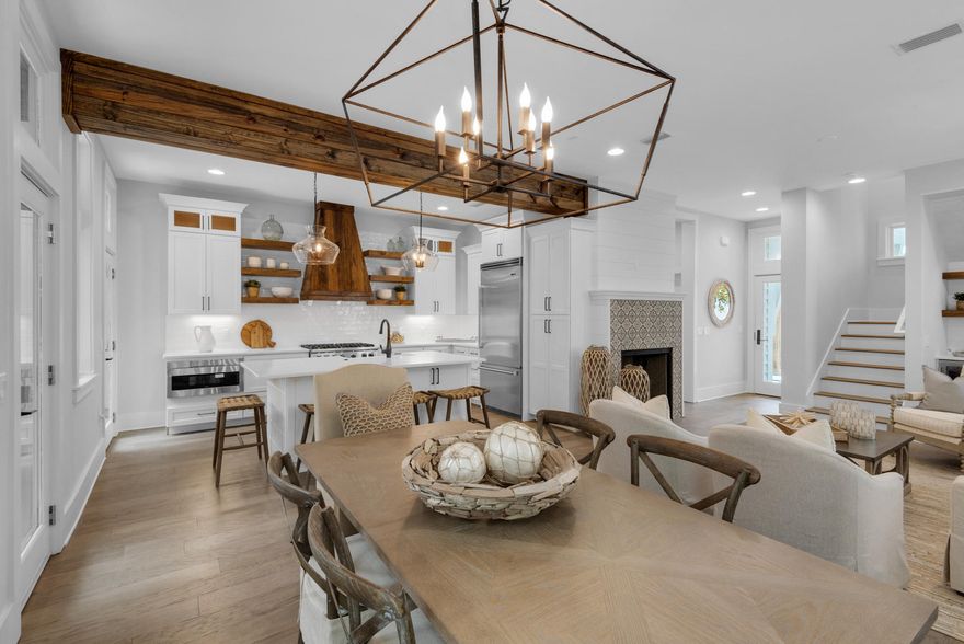 Must see this newly ''remodeled'' home in Rosemary Beach. A second home or luxury investment property offer 3 Master's w/ private baths and balconies. Bunk room sleeps 4. First floor living with open concept, commercial Viking Appliances and huge Island w/ Quartz countertops, farm sink and floating shelves. Fireside family room & dining w/ wet bar, ice maker and beverage center perfect for entertaining. Beautiful Hardwoods throughout the home. The large laundry/mud room & powder room are just off living area. Walk out the back to the outdoor living w/ heated pool, outdoor FP and summer kitchen. The carriage house has 1 BR/ 1 Bunk room & sleeps 4-6. Great luxury rental opportunity