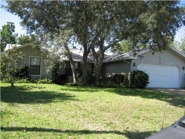 Great home conveniently located in the heart of Destin. Large open kitchen with ceramic tile and breakfast bar. Fireplace in the living room. New LVP flooring everywhere else.  Freshly painted. There is a large screened porch off the back. Large fenced backyard. Ceramic tile in the laundry room .  New dishwasher and Fridge on order. Come and take a look today. Call our office phone number for all showing appointments or for any questions