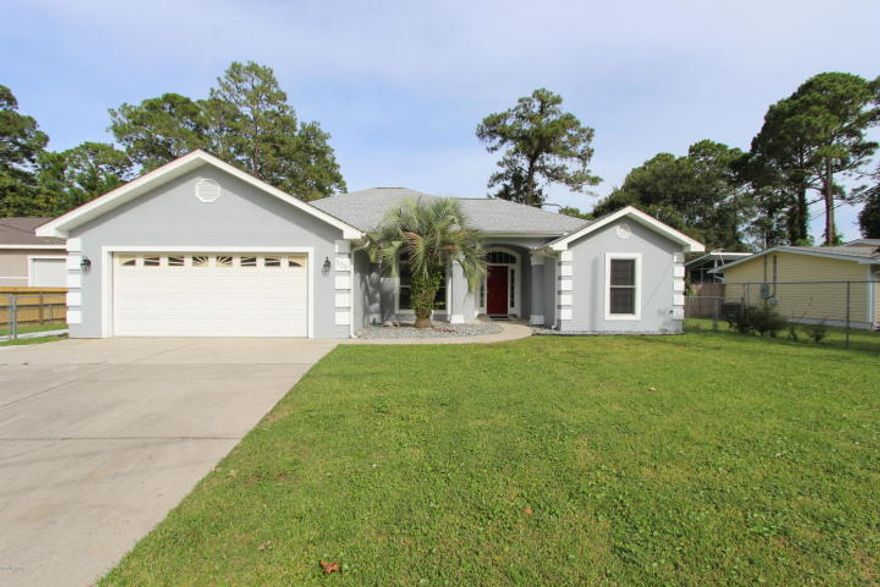 Great home located right in the heart of it all. Close to the beaches, airport and Pier Park. This property has 3 bedrooms and 2 baths. It has an open floor plan and is tiled throughout. The kitchen is spacious and comes with all the appliances. The master bedroom has a huge walk-in closet as well as a large bathroom. There is an enclosed patio and also an attached open patio. They have just poured new walkways leading to the new 15'x21' yard building. Come and view this property today.