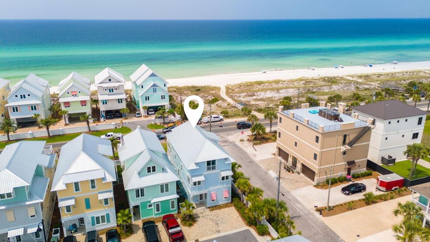 Investor Opportunity: High-Yield Beachfront Luxury in Margaritaville Beach Cottages ResortInvestors, take note--this is the one! Positioned just one tier off the Gulf and located in the sought-after Margaritaville Beach Cottage Resort, this premium 3,223 sq ft, 6-bedroom, 6.5-bath coastal retreat is not just a vacation home--it's a rental powerhouse. This is the one savvy investors have been waiting for--a turnkey, revenue-generating luxury beach home in the sought-after Margaritaville Beach Cottage Resort. Located just one tier off the Gulf,  this stunning 6-bedroom, 6.5-bathroom property spans 3,223 square feet and sits on a premium corner lot with unobstructed Gulf views from every level. Professionally furnished and thoughtfully designed with high-capacity rentals in mind, this home is already a high-performing short-term rental with strong historical income and impressive occupancy rates. With six spacious king suites, a dedicated bunk room enclave, and expansive indoor/outdoor living spaces, the layout is ideal for hosting large groups, multi-generational families, and repeat vacationers seeking luxury on the Gulf Coast.From the moment guests enter, the home impresses with upscale finishes, including quartz countertops, coffered ceilings, high-end Frigidaire Professional appliances, and fun, coastal touches like a margarita machine and wine fridge. The private spa and multiple entertainment zonescomplete with a third-level game room featuring foosball and dartskeep guests coming back year after year.
Located just steps from 580 feet of private beachfront, the resort offers guests access to an incredible lineup of amenities including a 425-foot lazy river, waterslides, a poolside bar and grill, outdoor movies, fire pits, a dog park, and pickleball courts. A new on-site restaurant, fitness center, and kids' arcade just openedonly adding to the already strong rental demand. Positioned minutes from Pier Park's shops, restaurants, and attractions - including the newly opened Pirates Caribbean Dinner Theatre (a Dolly Parton Company) and soon-to-open Top Golf, this home offers not just immediate income but long-term value in one of the Gulf Coast's most in-demand vacation rental markets. Whether you're expanding a short-term rental portfolio or seeking a luxury beachfront asset with serious income potential, this fully-furnished, turnkey, rental-ready home is an exceptional opportunity. Cheers to sun, sand, and spectacular returns.Schedule your private tour today and see why this rental-ready gem is one of the smartest investments on the Gulf Coast.
