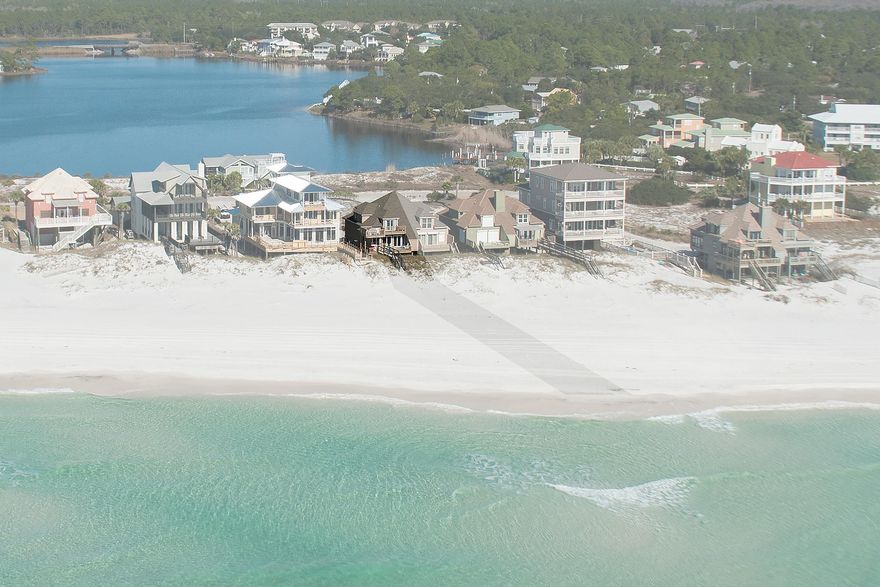 ''In the Sand'' is a spacious, Gulf front vacation rental in Seagrove Beach. This homes interior has been completely renovated with a soothing neutral color palate. Enjoy spectacular sunset views from the second and third floor balconies. ''In the Sand'' offers a reverse floor plan with the main living area on the second floor, joined by one of two master suites. Perfect beach home for large families or those who love to entertain. In 2012 it grossed $57.8 with 11 owner blocks and in 2013 it was $62.3 with 14 owner blocks.