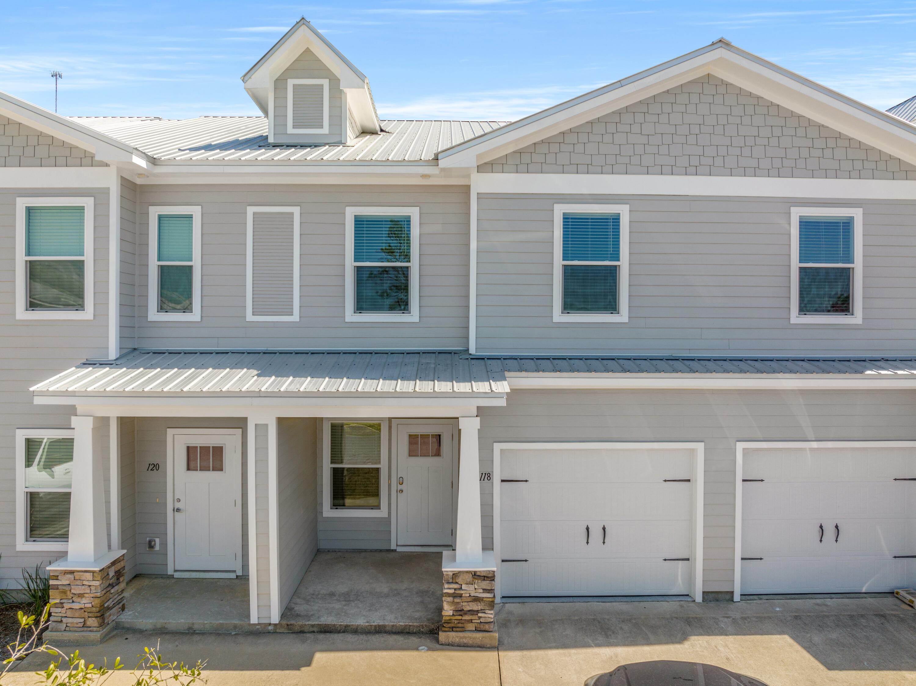 Quality & Affordable in South Walton only minutes to the white sand beaches of the Emerald Coast! This Savannah Floor plan is 3BR / 2.5 BA with a total of 1485 sq.ft. including a garage and will have luxury finishes including QUARTZ Countertops throughout, Stainless Steel Appliances and Luxury Vinyl Plank flooring. Screened back porch sitting area and the garage is finished including stained floor. This unit is less than 200 feet from the community pool.