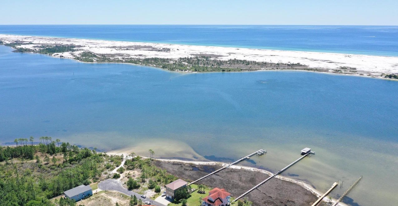 Build your dream home on this fabulous waterfront lot located inside the gated community of Cobia Bay South. One of the last large oversized lots in Okaloosa County. This lot has the potential to have amazing gulf views. Short boat ride to crab island and the Destin Pass.