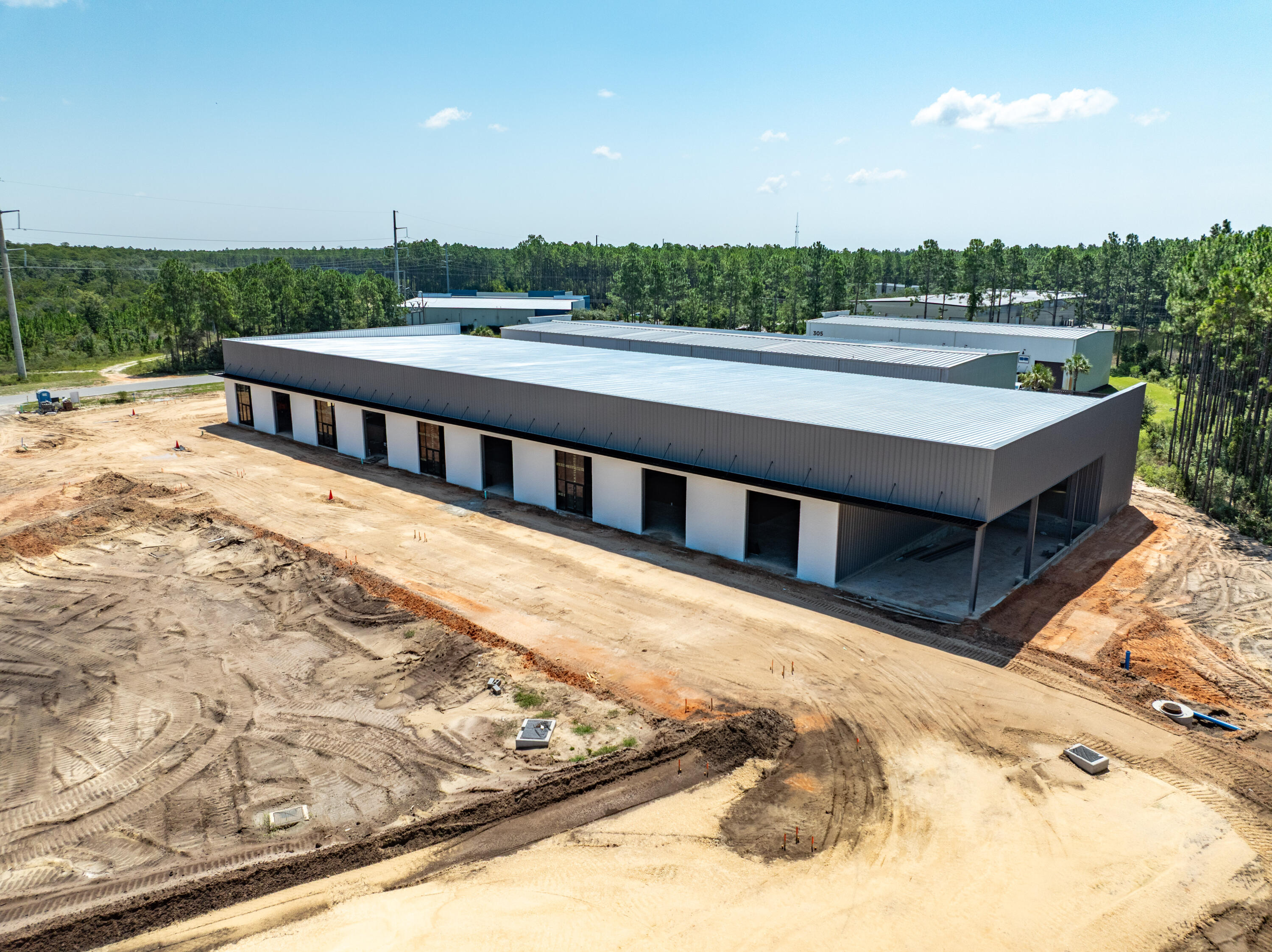 25,430 square foot freestanding building with loading dock under construction in South Walton Commerce Park of the flourishing Santa Rosa Beach, Florida market! Please inquire for further details. The site plan is uploaded to this listing. This subject new development project involves Walton County, Florida parcels: 05-3S-18-16010-000-0050 AND 05-3S-18-16010-000-0060