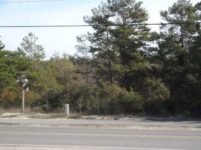 Lot on 30A zomed VMU. South side of Hwy 30A across street from new proposed development on the old collaborations site. Great location for office etc.