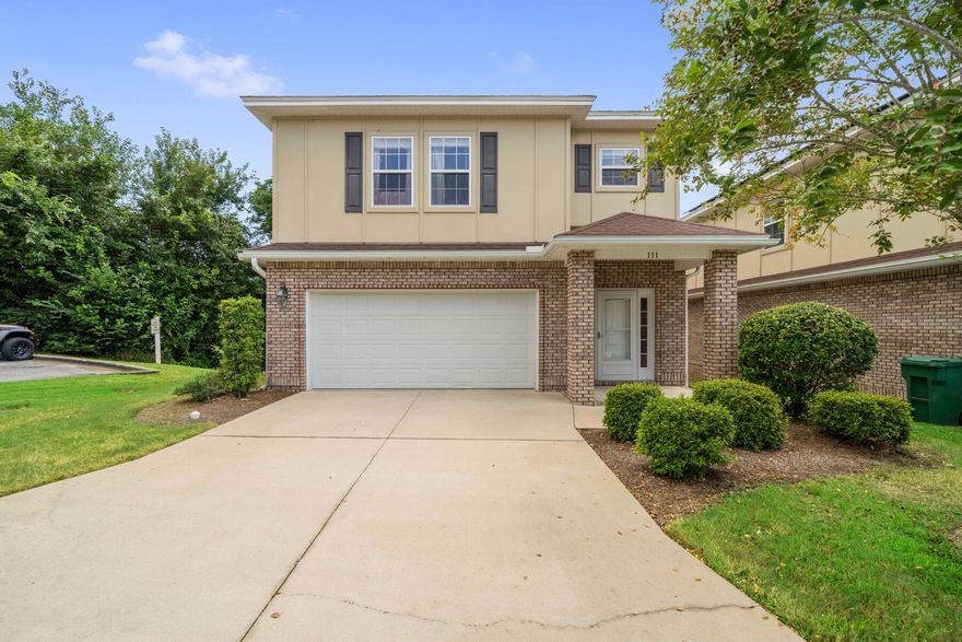 Welcome to 111 Big Oaks Lane! This well-maintained, 4-bedroom, 2.5-bath, and 2-car garage home is located in Traditions at Walton Oaks--an easy, low-maintenance subdivision in the heart of Niceville!The open floor plan on the main floor is perfect for entertaining, whether you're hosting friends or enjoying cozy family gatherings. The kitchen offers plenty of cabinet space, sleek stainless steel appliances, and granite countertops, all while overlooking the living room and dining area. Step outside to your screened-in back deck and relax in the covered patio area with ceiling fans--ideal for unwinding year-round.All four bedrooms are conveniently located on the second floor, providing privacy and space. The spacious master bedroom is a true retreat, featuring a large walk-in closet and a well-appointed master bath complete with a soaking tub, separate shower, and a private water closet. The remaining three bedrooms share a guest bathroom with double vanity sinks. The spacious laundry room is perfectly situated near the bedrooms for easy access and includes cabinets for extra storage and a utility sink!

This home sits on the largest, fenced-in lot in the neighborhood and backs up to a serene tree line. Stroll over to the community gazebo or explore the Turkey Creek Nature Trail right next door. Just 3 miles to Eglin AFB, close to shopping, restaurants, parks, and a short drive to beautiful Destin beaches, this home is truly a can't-miss opportunity!