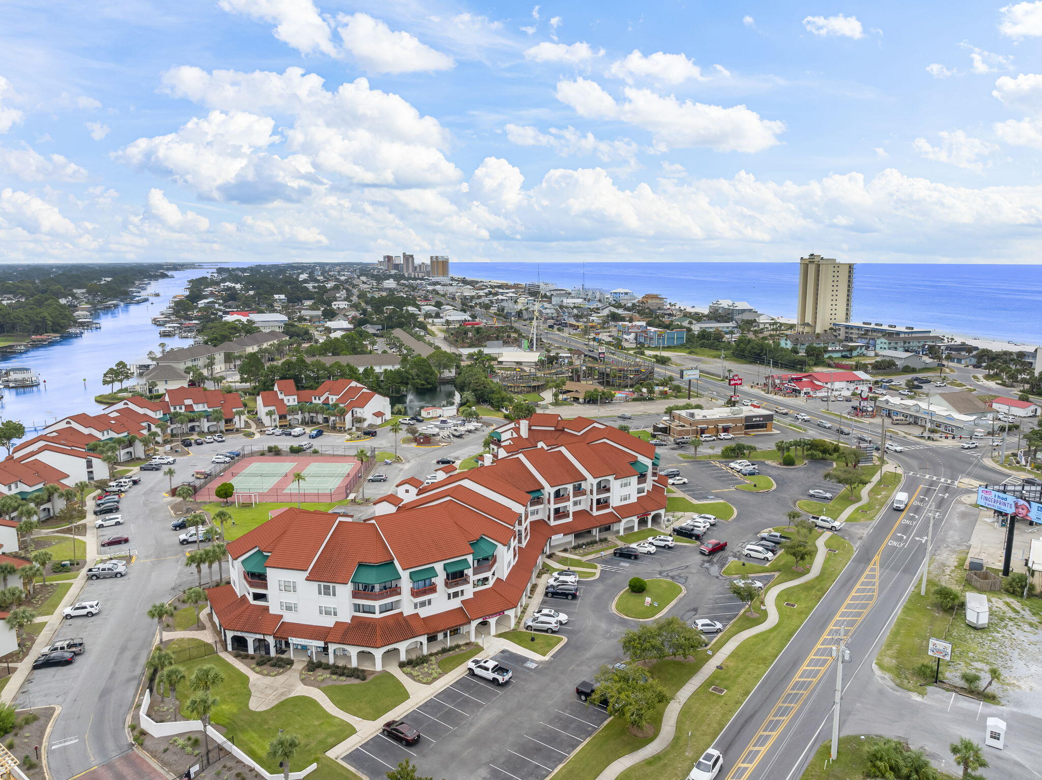 Welcome to Plaza of St. Thomas, where this beautifully updated 1-bedroom, 1-bath condominium offers an excellent opportunity to enjoy Panama City Beach living. This residence features a spacious living area with views of Panama City Beach with modern finishes throughout this beautiful condo. Located less than a block from Beach Access #23, you can enjoy the sugar-white sands and emerald waters of the Gulf of America just steps from your front door. The gated community provides an array of amenities including a pool, tennis courts, firepit, corn hole, boat dock, and boat parking area. Boating enthusiasts will appreciate quick access to both the Bay and the Gulf, while beach lovers can take advantage of easy public access for daily walks by the shore. The property is conveniently situated near shopping, dining, entertainment, and local attractions, as well as the Navy base. Whether you are seeking a full-time residence, a vacation retreat, or a property with rental flexibility, short term rentals allowed, this condo offers a versatile lifestyle in a highly desirable location. All measurements and information are deemed reliable but should be verified by the buyer if important. Don't miss the opportunity to make this your own piece of paradise on Panama City Beach.