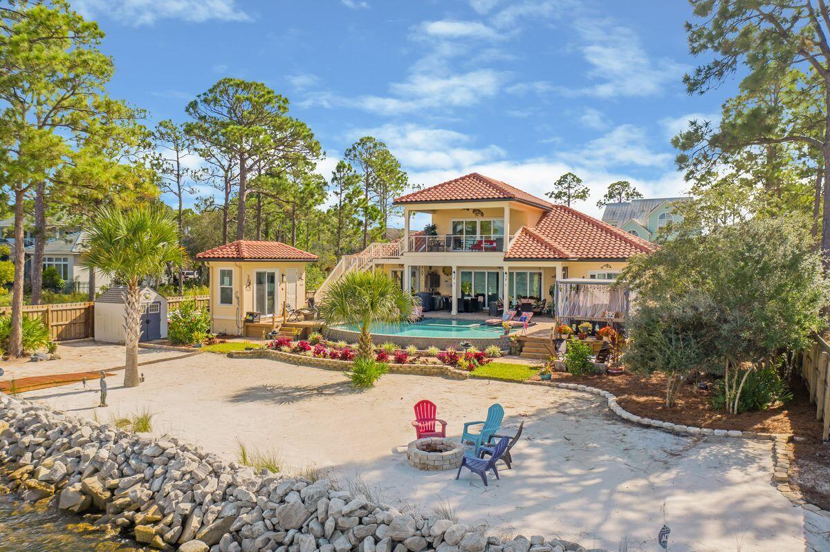 No detail or expense was spared in this custom-built, four-bedroom home built in 2016 by the highly respected builder, Tate Watson of 850 Building Group. This meticulously maintained home, located on a quiet, private street, sits at the mouth of Hogtown Bayou on Choctawhatchee Bay and is in close proximity to Grand Boulevard, Sacred Heart Hospital, Scenic Highway 30A and the white-sand beaches of South Walton. Complete with more than 2,600 square feet of living space, this home offers an open floor plan with endless custom upgrades throughout. The great room, living, dining and kitchen areas flow seamlessly for convenience in day-to-day living and entertaining.