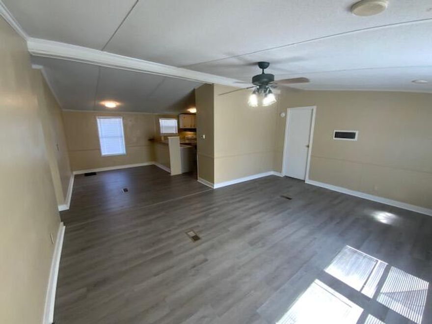 Newly updated 3 Bedroom 2 Bath home - sitting on 2 lots. LVP Flooring throughout, new cabinets, new countertops, new lighting. Good area with many new homes in the neighborhood. No PETS and credit check required. Lawn care included.