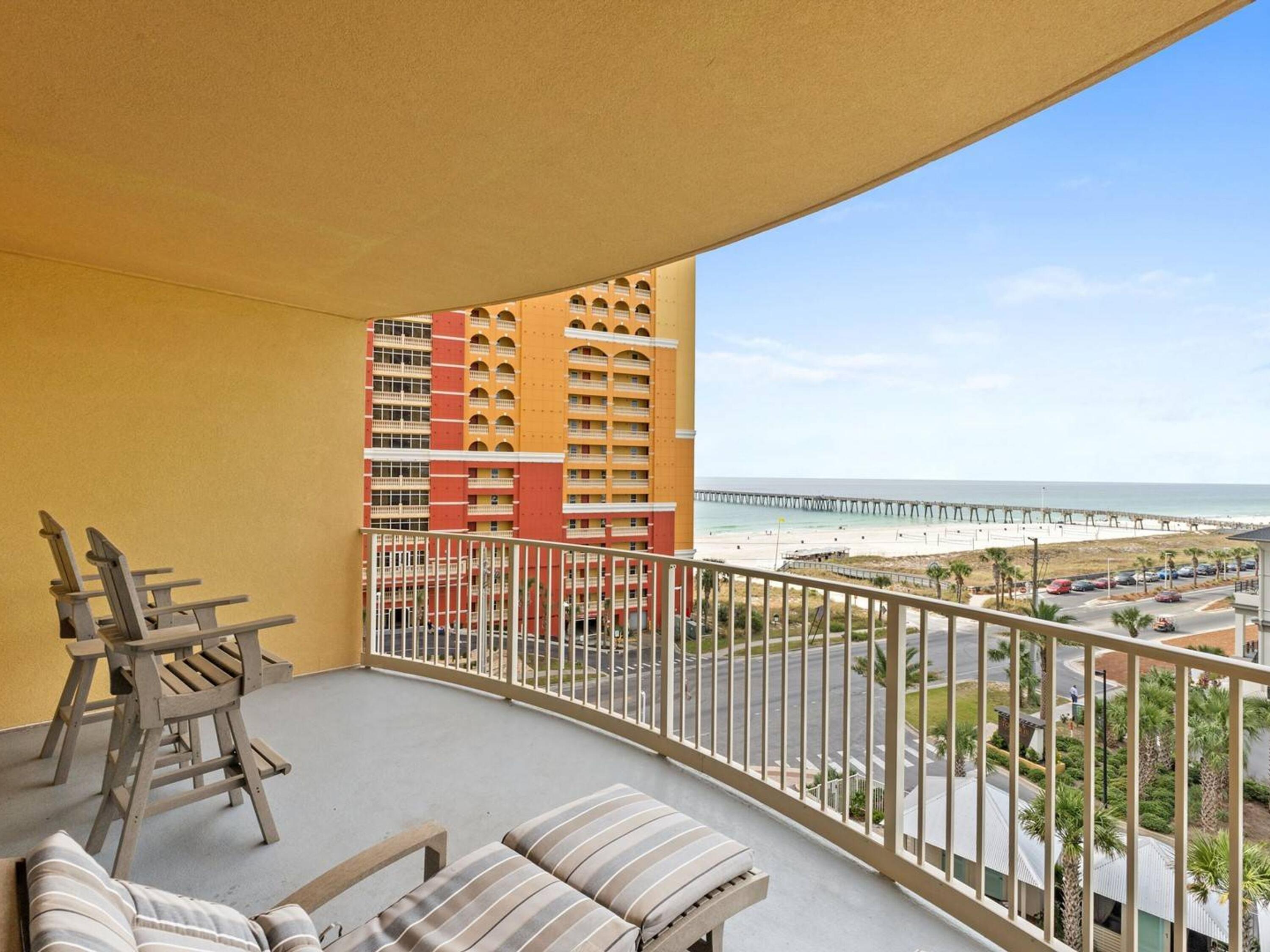 Enjoy breathtaking views of the Gulf of America and Pier Park from this sixth-floor beach retreat. Built in 2020, this is the newest luxury high-rise built in Panama City Beach in the past decade. Designer decorated and rental ready, this fully furnished condo is well appointed with luxury vinyl plank flooring giving way to tile in the bathrooms. The kitchen comes fully equipped with modern appliances, quartz countertops and white cabinets. A shiplap breakfast bar makes the perfect place to start the day, mapping out the day's activities over coffee and pancakes. A dining area sets the tone for sharing laid-back evening meals together after a fun-filled day. The great room is tastefully decorated in relaxing tones with nine-ft. ceilings and plenty of natural light through a wall of sliding glass doors. Step outdoors onto the oversized balcony and look forward to an alfresco lifestyle within sight of the beach and waves. This spacious condo can easily accommodate six with a king bedroom, hallway bunks (twin-over-twin), and a sleeper sofa. Two beautifully appointed bathrooms include a master ensuite with a walk-in shower and a spacious vanity. It provides all the comforts of home, right down to a full-sized washer and dryer in the unit. The Calypso Resort lifestyle boasts first-class amenities, including a heated swimming pool, hot tub and poolside cabanas, along with a fully equipped fitness center. There's a cozy firepit lounge and two tiki bars for socializing and meeting new friends. Right next door, Pier Park offers a host of shopping and dining opportunities within easy strolling distance for you and your guests. This nicely maintained condo is already on a rental program, making it ideal as an investment opportunity when not required by the owner. Covered parking, on-site security and private beach access round off the excellent amenities at this exceptional beach retreat.