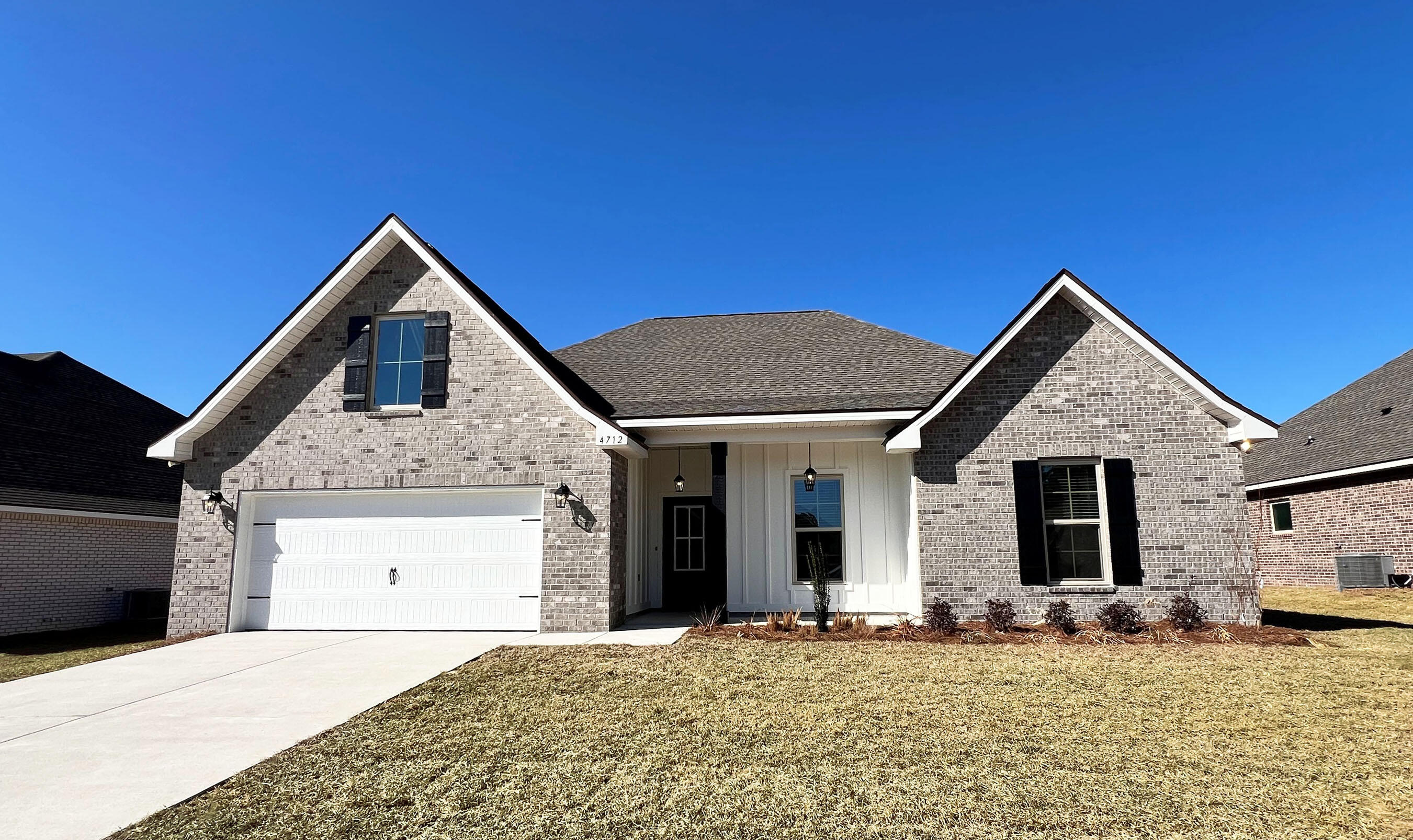 Awesome builder rate, FREE window blinds + choice of 2 FREE: front gutters, fridge, OR smart home package. Restrictions apply.The CAMELLIA V H in Patriot Ridge community offers a 4BR, 2BA, open design. Upgrades added (list attached).Features: double vanity, garden tub, separate shower, and walk-in closet in master suite, kitchen island, walk-in pantry, boot bench in mudroom, covered front porch and rear patio, recessed lighting, crown molding, ceiling fan in living and master, framed mirrors in baths, smoke and carbon monoxide detectors, landscaping, architectural 30-year shingles, flood lights, and more!Energy Efficient Features: electric water heater, a kitchen appliance package with a electric range, vinyl low E MI windows, and more! Energy Star Partner.