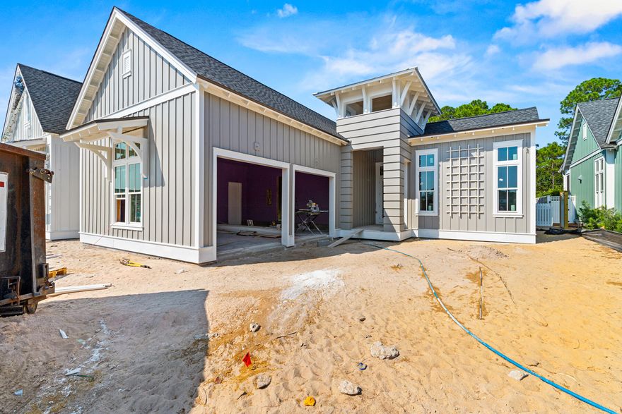 Welcome to the Rosecliffe II by Romair Homes - a beautifully crafted single-level residence that offers an elevated blend of coastal charm and modern sophistication in the sought-after Powell Landing East neighborhood of the Watersound Origins community. This 4-bedroom, 4.5-bathroom home spans 2,609 SF and features 12' ceilings throughout and engineered white oak flooring, creating a sense of grandeur and effortless elegance from the moment you enter. Designed for both everyday comfort and elevated entertaining, the open-concept living area is anchored by a modern yet cozy 42'' fireplace with a stucco chimney. A wall of 10' PGT sliding glass doors blurs the line between indoors and out, leading to a generously sized covered porch, expansive pool deck, and a cabana with fireplace- an inviting backdrop for relaxing evenings and social gatherings.
The private backyard is a true sanctuary, featuring a gunite saltwater pool with integrated spa and a spacious paver pool deck with plenty of space for lounging in the sun. Inside, the chef's kitchen is a true showpiece with stained white oak cabinetry, champagne plumbing fixtures, Silestone quartz countertops, and top-of-the-line GE Monogram appliances, blending high-end performance with designer sophistication. Each of the four bedrooms has its own ensuite bathroom with designer tilework and illuminated shower niches for added ambiance as well as a spacious closet.  
With its unique architectural appeal, thoughtfully selected finishes, and an emphasis on indoor-outdoor connection, the Rosecliffe II offers the perfect balance of beautiful design and inviting atmosphere. Estimated Completion: January 2026.
Experience refined coastal living in one of Watersound Origins' most sought-after neighborhoods nestled alongside Lake Powell. The Watersound Origins community offers an unparalleled lifestyle in South Walton - exceptional amenities, notoriously friendly and welcoming atmosphere, zero short-term rentals, and close proximity to all that 30A and Inlet Beach has to offer. Enjoy the zero-entry pool, playground, sports courts, and fitness center at the Village Commons, play a round of golf or foot golf at the Origins Golf Course, or take a walk along the many miles of walking and biking trails that wind all throughout the neighborhood! The new Watersound Town Center located at the entrance to the community offers several fantastic dining options (casual and formal), medical services, Starbucks, Publix, a Pavilion that hosts events year round, and more!