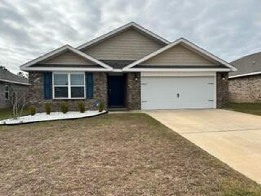 This subdivision located close to schools features a community pool  and play area. The like new  home features 4 bedrooms, 2 bathrooms and 1830 SF  of living space. The open kitchen features an island, stainless appliances and granite countertops. The kitchen opens to the great room with access to the covered porch. The main living area and all wet area have LVP flooring and the bedrooms have carpet. The neutral paint color throughout will go with any decor. A pet will be considered with owner approval. The home will be available April 1. The HOA fees are included in the rent and tenants will have access to the amenities.