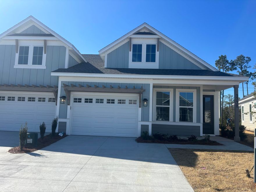 MOVE-IN READY! Professional photos coming soon.... Welcome to The Villas at Longleaf Park in the Watersound Origins community, offering stylish paired/attached villas by Fischer Homes. The LUCAS plan, a beautifully designed 2-bedroom, 2-bathroom single-level home, features 1,418 sq. ft. of effortless living space and a 1.5-car garage. Step inside to an inviting open-concept layout with a modern kitchen, spacious dining area, and a bright living room that seamlessly flows into a covered patio with wooded views, perfect for outdoor relaxation. The primary suite overlooks the backyard and boasts a spa-like ensuite bathroom with a double vanity and a generous walk-in closet. This home includes standout features like luxury vinyl plank flooring throughout, 10' ceilings, upgraded countertops throughout, and more. See finishes selections (in Documents) chosen for this beautiful home! 

Enjoy the ease of a low-maintenance lifestyle, HOA membership covers lawn care and exterior home upkeep, giving you more time to enjoy the exclusive amenities Watersound Origins has to offer such as the Origins Golf Course, a resort-style pool, sports courts, and more. This is your opportunity to embrace easy living in a vibrant, amenity-rich community. 