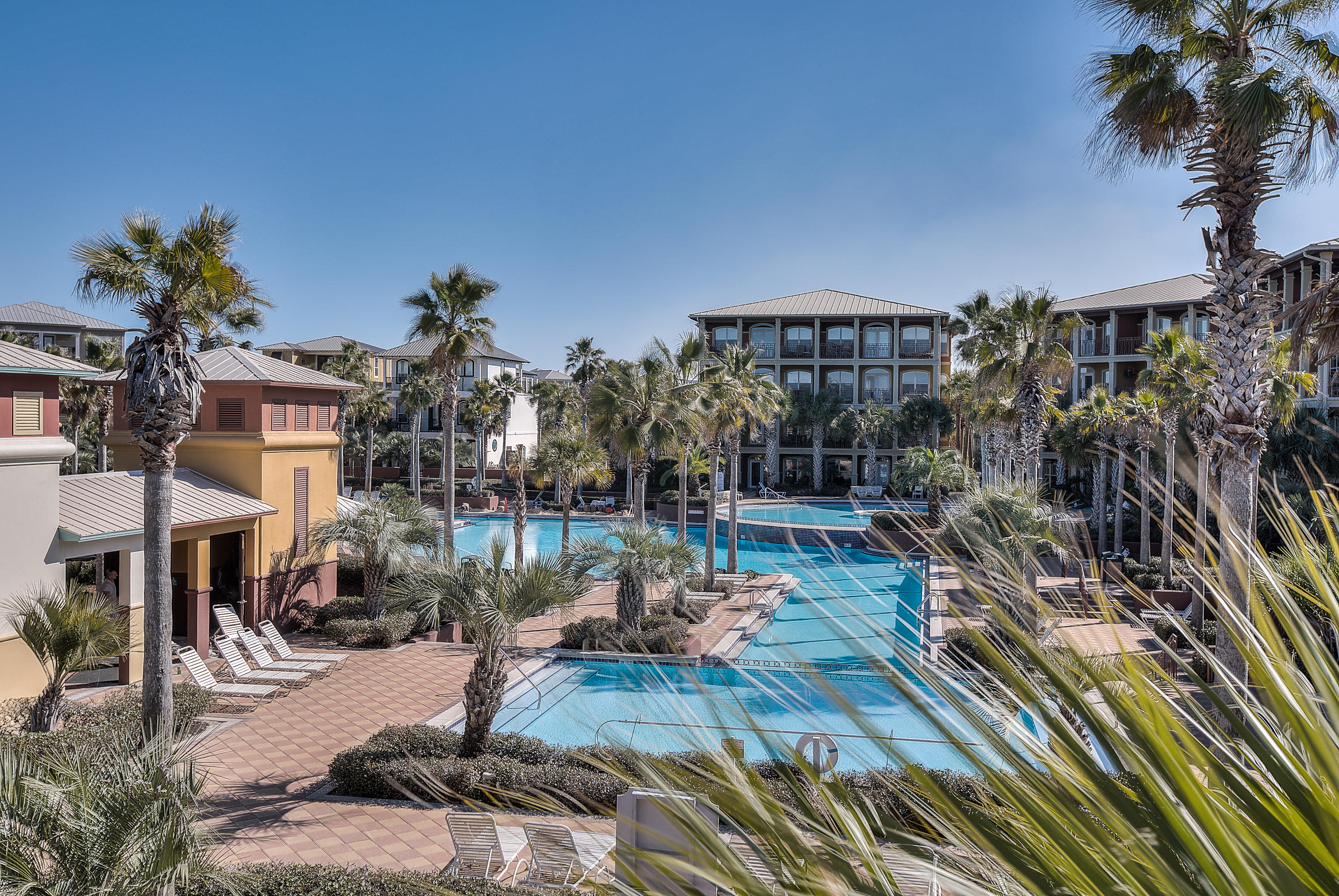 'SUNSPOT' is the ONLY POOLFRONT HOME available to buy at Seacrest Beach! Recently UPDATED, this home has a FRESH LOOK & has been RENTED ALL SUMMER!! We are PAINTING THE EXTERIOR soon & just reduced $5000.for upgrades to bath & kitchen. A great view of SEACREST BEACH 12,000 sf LAGOON POOL from your Living area, back porch, & Master Suite deck. This cottage is a PERFECT VACATION RENTAL because you walk out your private gate to the pool & amphitheater area. Large Living, Dining, & Kitchen area give families plenty of space to 'hang out' together. 2 BR downstairs are great for children/guests. Owners will really enjoy the ENTIRE 2nd floor which is a HUGE MASTER SUITE with oversized bath including soaking tub, separate shower, double vanities. PRIVATE covered deck off Master Suite.