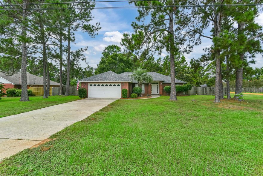 Beautiful 3/2 split floor plan with 1,740 sqft near the front entrance of Holley by the Sea! This home has a new roof (2021), new carpet, fresh paint (doors, walls & trim), brand new stainless steel appliances and resurfaced kitchen cabinets. The fully fenced backyard is large enough for a pool and has plenty of privacy and shade to keep you cool during the summer. This home is perfect for a first time home buyer, investor or retiree. It has easy access to all of the world class amenities including swimming pools, tennis courts, a boat launch, playground, fitness center and more!