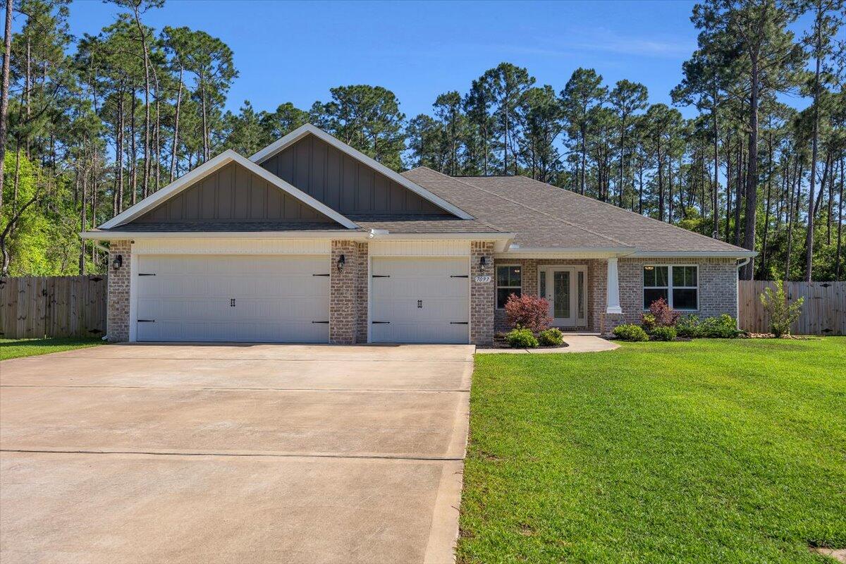 Make your appointment today! This Desirable turn key ready Port Royal VI floor Plan won't last long. Open Spacious floor plan offers 4 bedrooms, 3 full baths, 2 flex/bonus rooms, and 3 car garage. Home features: covered front porch,10 ft ceilings, spacious living area with double trey ceiling, floor outlets, kitchen is a chefs delight with recess lighting, stainless steel appliances, soft close cabinets, under-mount cabinet lighting, pantry, granite counter tops, Large island with elegant pendant lights overlooking living area, breakfast cafe off to the side. Sizable owners Suite with double trey ceiling, bath includes: Stunning walk-in tiled shower with a separate garden tub, double vanity, large walk-in closet. Exterior covered lanai 17x15, situated on .46 acres enough space for all your outdoor entertainment. Also home has gutters, sprinkler system, privacy fence, sewer, in Holley By the Sea.