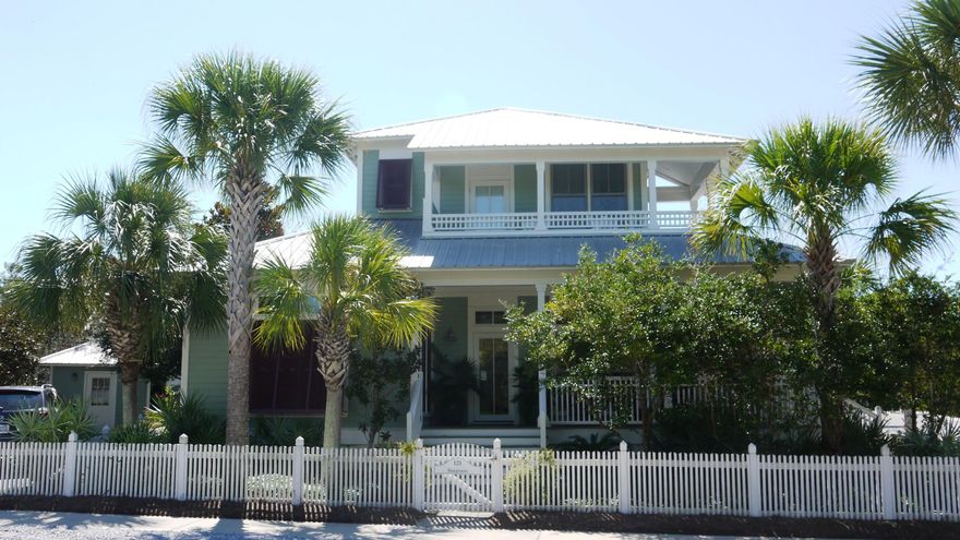 ''Seagrass'' is an exceptional house, located on a large corner lot, across the street from the Westside Pool and Bellview Park. It has two master bedrooms, a guest bedroom and a ''4-bunk'' bunk room, along with three full baths. There is a large and wonderful screened porch on the back of the house with an outdoor shower and separate storage shed. There is a large driveway and parking area, finished with pavers, professional landscaping, and wraparound front porch. The upstairs covered porch, off the master bedroom, overlooks the beautifully kept green and community pool. This house is perfect for a family beach home, or full-time residence. It also has an excellent rental history - perfect for investment property. Being sold fully furnished and ready to move in.