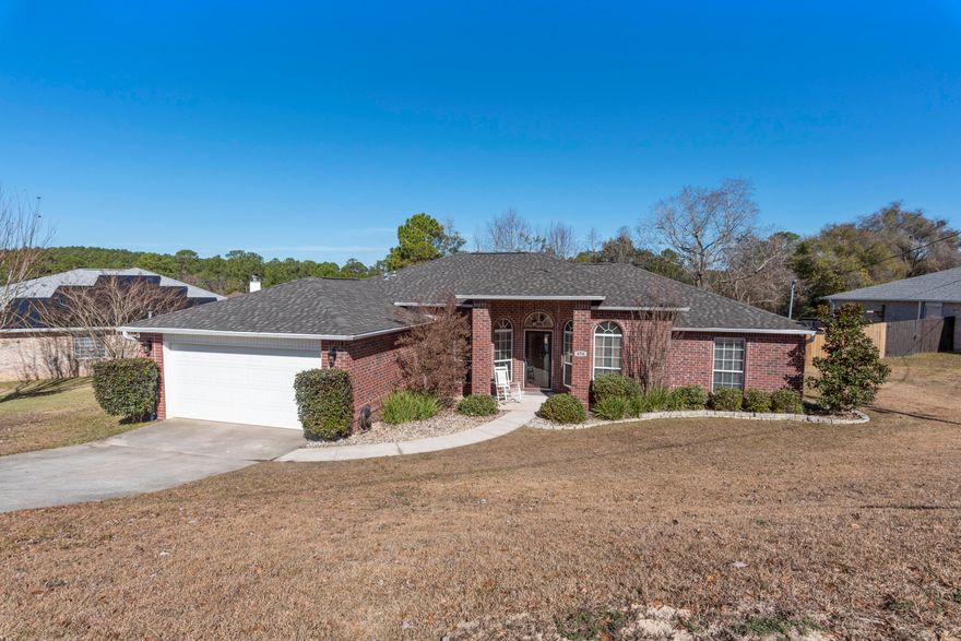 Just One Look At This Adorable Home & You'll Easily Fall In Love! With 4BR/2BA Approx. 1952 Sqft., It's The Perfect Place To Call Home! This Split Floor Plan Is Packed With Amazing Features Such As: Hardwood Floors, Stainless Appliances, Beautiful Backsplash, Garden Tub, State-Of-The-Art Outdoor Surveillance System, HUGE Covered Patio & So Much More! Conveniently Located South Of I-10 In Westview Estates With NO HOA Fees! Situated On A Spacious Fenced Lot That Is A Short Drive To The Beach! Located Just Mins From Dining, Shopping & Entertainment That Crestivew Has To Offer. Don't Miss The Opportunity To Make This One Yours...Call Today To Arrange Your Private Viewing!