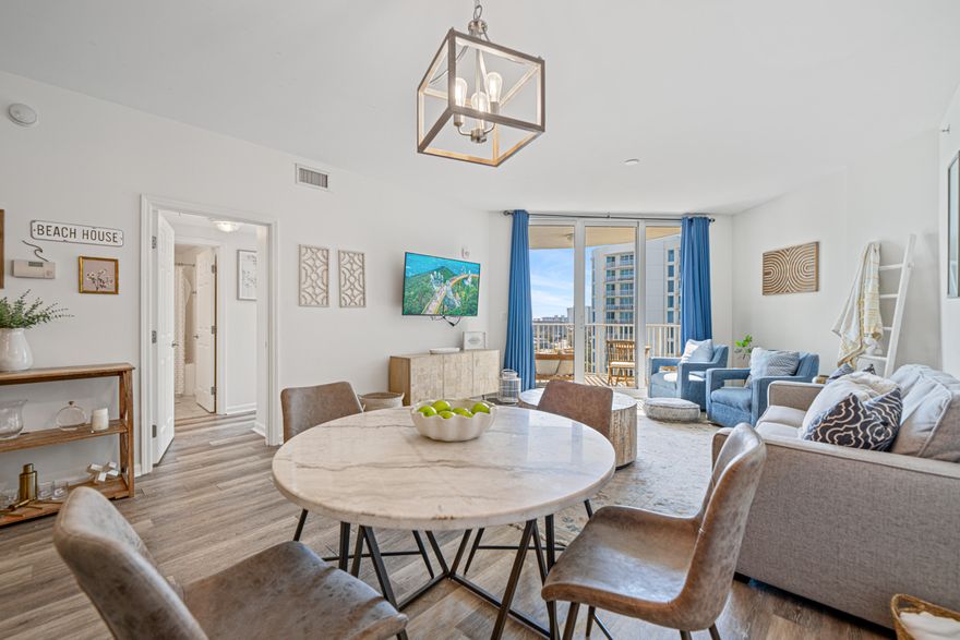 This beautifully renovated 2-bedroom, 2-bath unit is fully furnished with all new decor and furnishings, offering a fresh and modern atmosphere. With plenty of natural light throughout, the condo features a wonderful view,  painted cabinets, and updated light fixtures. Step out onto your private balcony to enjoy the gorgeous Emerald Coast sunsets while overlooking the expansive 11,000 sq. ft. zero-entry pool. For added convenience, a free seasonal shuttle makes it easy for guests to access the area's stunning beaches. The property boasts incredible amenities including a lagoon pool, heated pool, hot tub, pickleball courts, basketball courts, playground, full gym as well as on-site coffee shop, restaurant, and bistro bar. Gross rental over $40,000.00!