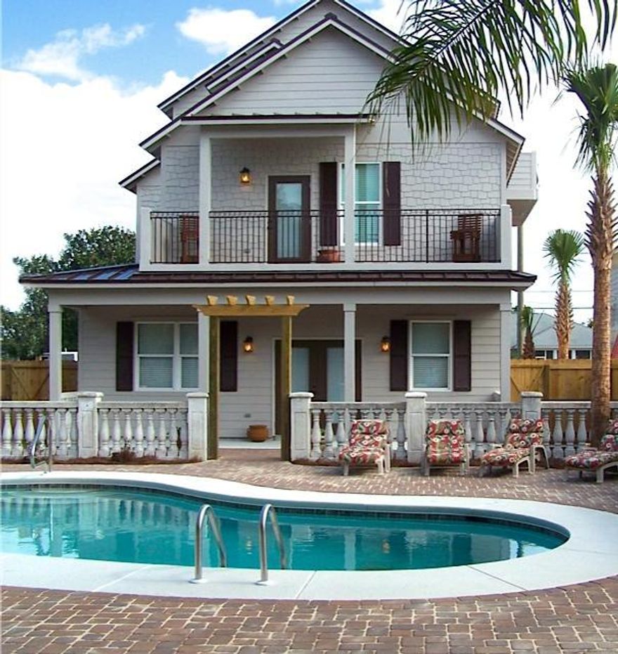 Excellent investment opportunity with NO HOA AND NO REQUIRED FLOOD INSURANCE!! Currently $100k+ in rental revenue already on the books for 2018 with an estimated gross rental income of $165k for the year. Beautiful and Fully Furnished 8 bedrooms plus 1 bonus room that can be a 9th bedroom with 8 baths. Sleeps 20! 3300+ sq ft of living space (4100 including covered porches) Large living area, 8 king beds and bunk room! Kitchen has custom granite counter tops, cabinetry and is fully equipped. Large fridge and washer & dryer too! Outside in the large back yard is your private heated pool(30X16), shower, lots of patio, and plenty of sun loungers. Plus the yard is completely fenced in for privacy! Driveway offers ample parking so bring your jetskis or boat! The beach is only a 2 minute walk literally only 300 footsteps!! Close to shopping and dining as well. This is an excellent addition to any investment portfolio. Truly a Must See, call for your private showing.