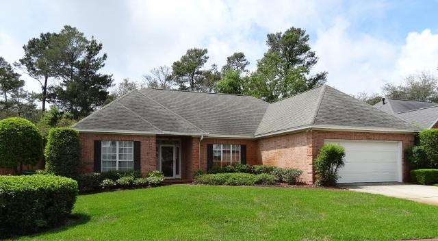 Tasteful and stylish is this 3 bedroom, 2 bath all brick, one-level home that was built to capture comfort and easy living. Many gracious upgrades during recent renovations are immediately noticed when entering. Keeping true to southern tradition, features include 9' smooth ceilings, deep crown and base molding, wood casing on the windows and a fireplace. Thoughtful planning and professional design of the upgrades and renovations feature wood floors in all rooms except the baths and Florida room, granite counters, custom window treatments, a Roman shower and tiled walls in the master bath just to name few. The addition of the heated and cooled Florida room greatly expands living space and is a wonderful place to enjoy the private back yard. Also noteworthy is the May 2015 roof replacement.
