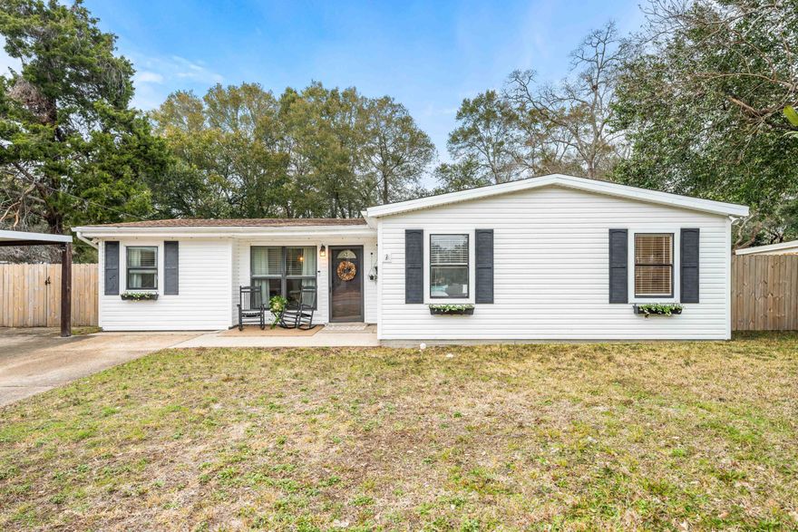 VA - Assumable Loan 3.5%. Experience contemporary living in this renovated 3-bedroom, 2-bath home with a versatile bonus room. Ideally located, this home offers easy access to pristine white sandy beaches, top-rated schools, an array of shopping options, and diverse dining experiences.The kitchen showcases granite countertops, custom cabinetry with crown molding, beautiful hardware, and an under-mount sink. A window over the sink offers a pleasant view of the backyard. The home features an upgraded electrical service panel and double-pane windows, and the HVAC was replaced in 2023. The bathrooms feature new vanities, mirrors, brushed nickel hardware, lighting, and towel racks, with the master bathroom offering the luxury of a frameless glass walk-in shower. Flooring throughout the house has been updated with laminate and tile for a sleek finish.
The open floor plan creates an inviting environment, with vaulted ceilings in the master bedroom, guest bedroom, living room, dining room, and kitchen, adding a sense of grandeur to the space.
Exterior features include a one-car carport and front gutters. Enjoy expansive outdoor living with an open patio in the fenced-in backyard, complemented by a storage shed for added convenience.